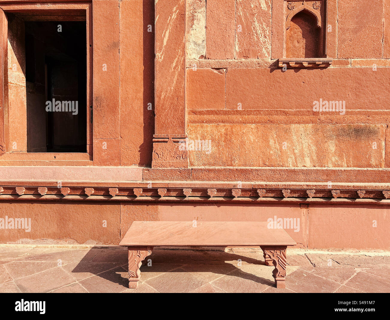 Architecture, designs of Mughal palace showing patterns and details of UNESCO World Heritage Site at Fatehpur Sikri in India - Smartphone Captured Stock Image