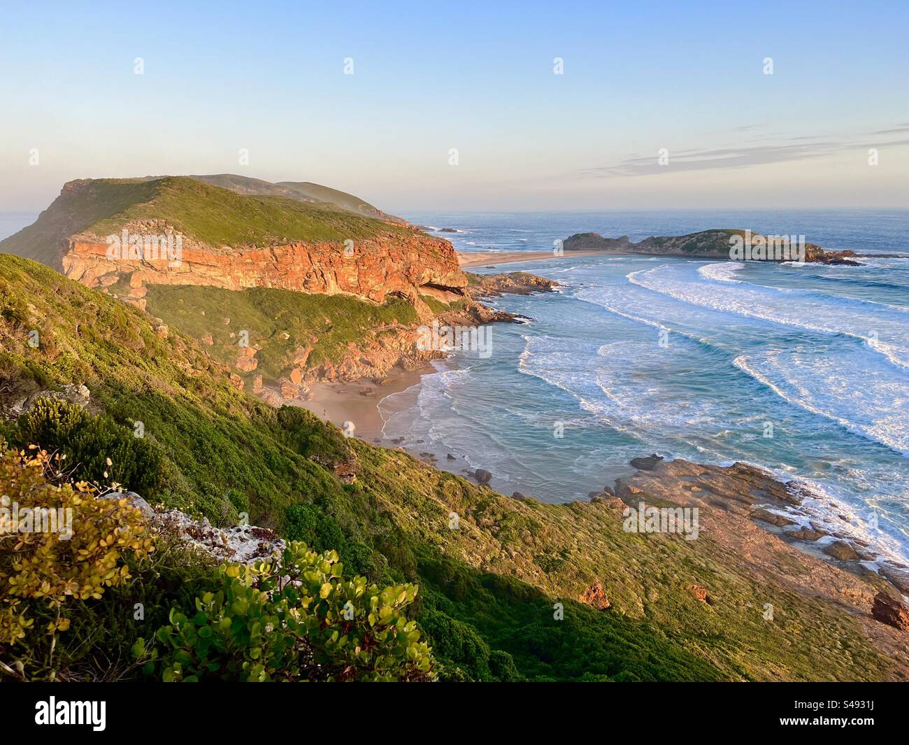 Golden hour along the Robberg Point Circuit hike near Plettenberg Bay, South Africa Stock Photo