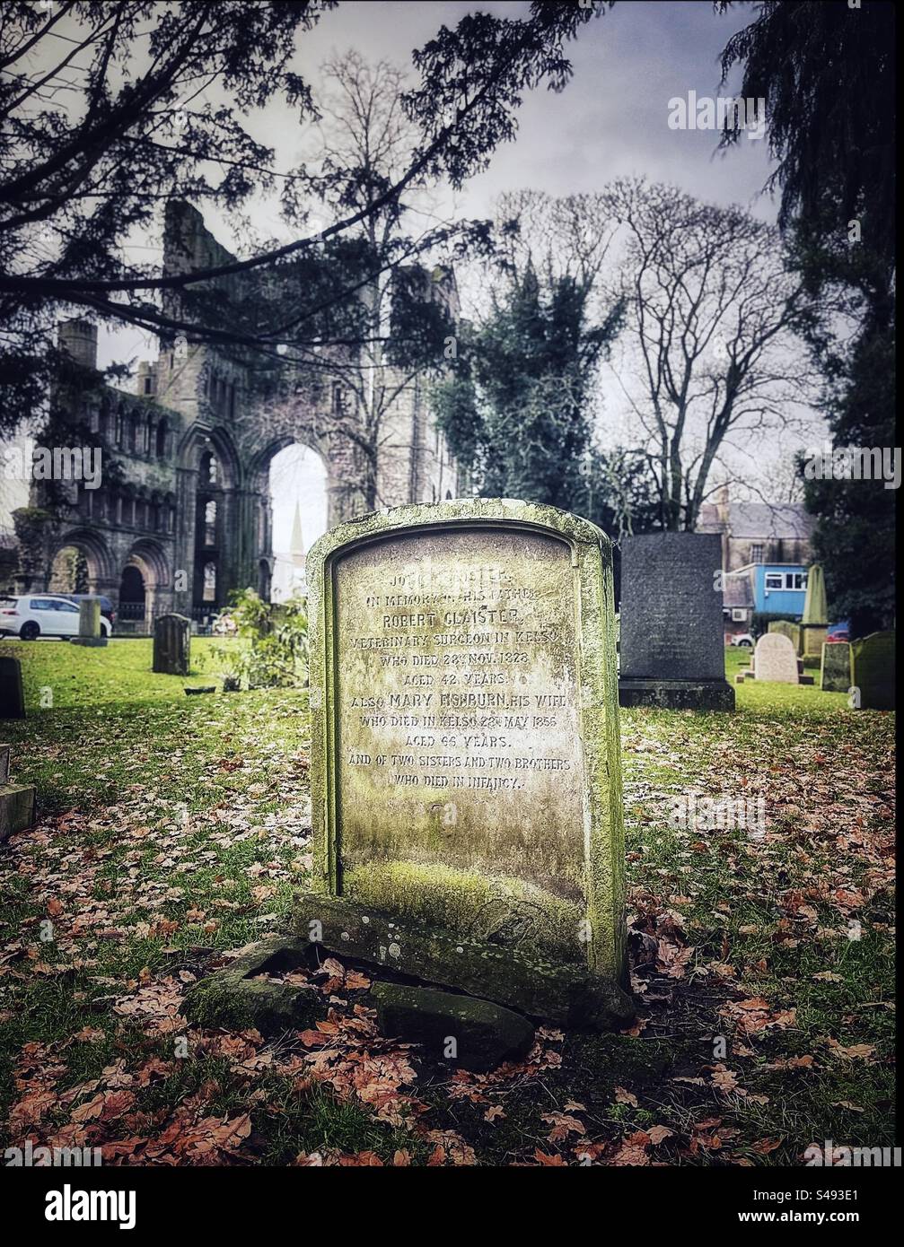 Old headstone on a graveyard beside Kelso Abbey. Stock Photo