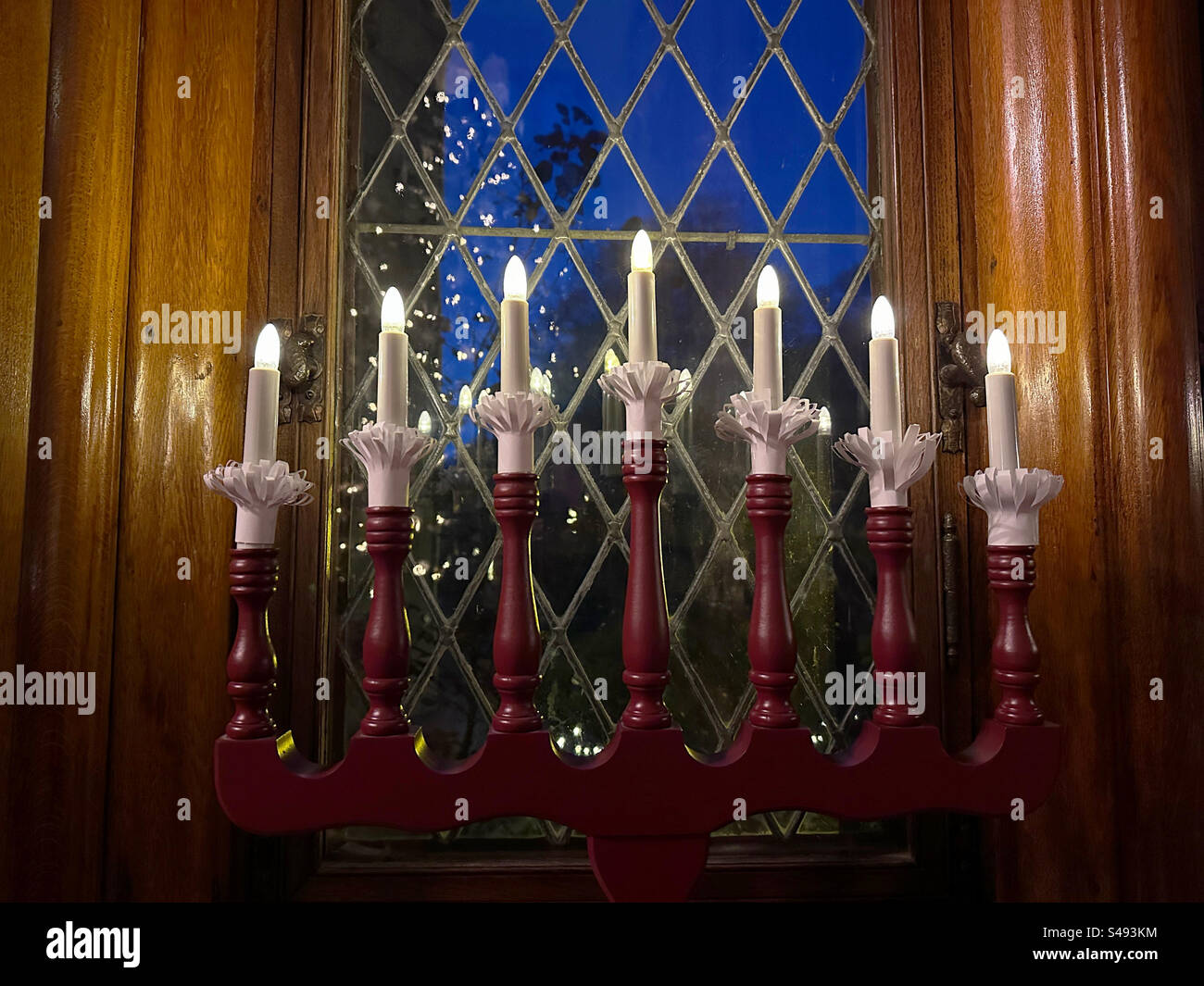 Candles in a window at Tjolöholms Slott, Halland Sweden. - Smartphone Captured Stock Image