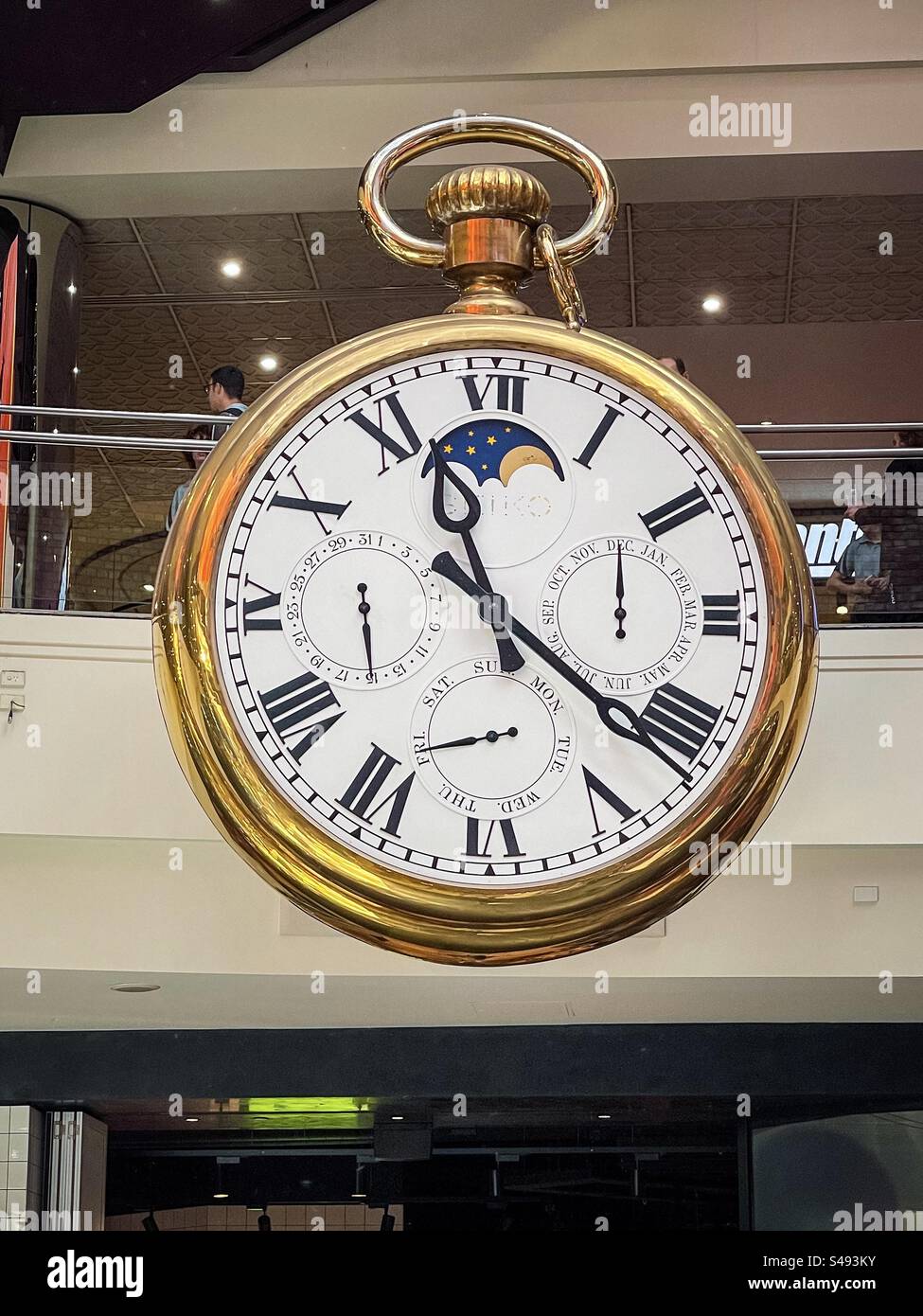 Giant clock showing time, date and day of the week at Melbourne Central mall in Melbourne, Victoria, Australia. Stock Photo