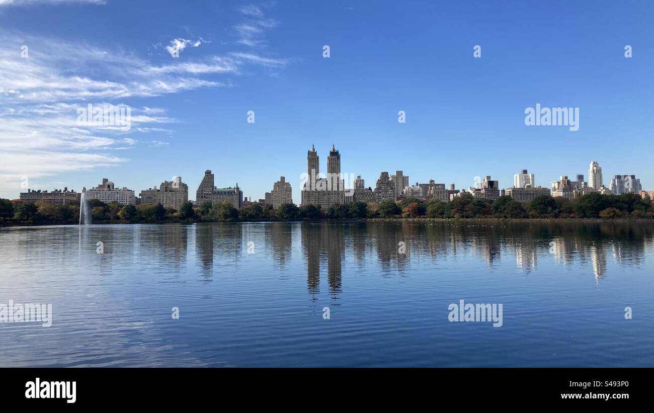 Perfect reflection in Jacqueline Kennedy Onassis Reservoir in Central Park - Smartphone Captured Stock Image