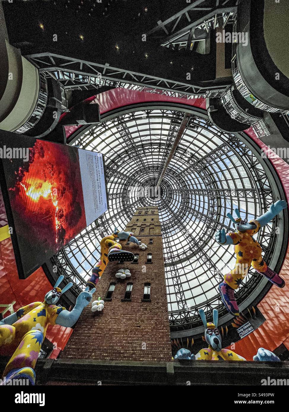 Ernie, inflatable art installation by Brolga at the historic Coop’s Shot Tower underneath the glass cone of Melbourne Central shopping mall in Melbourne, Victoria, Australia. - Smartphone Captured Stock Image