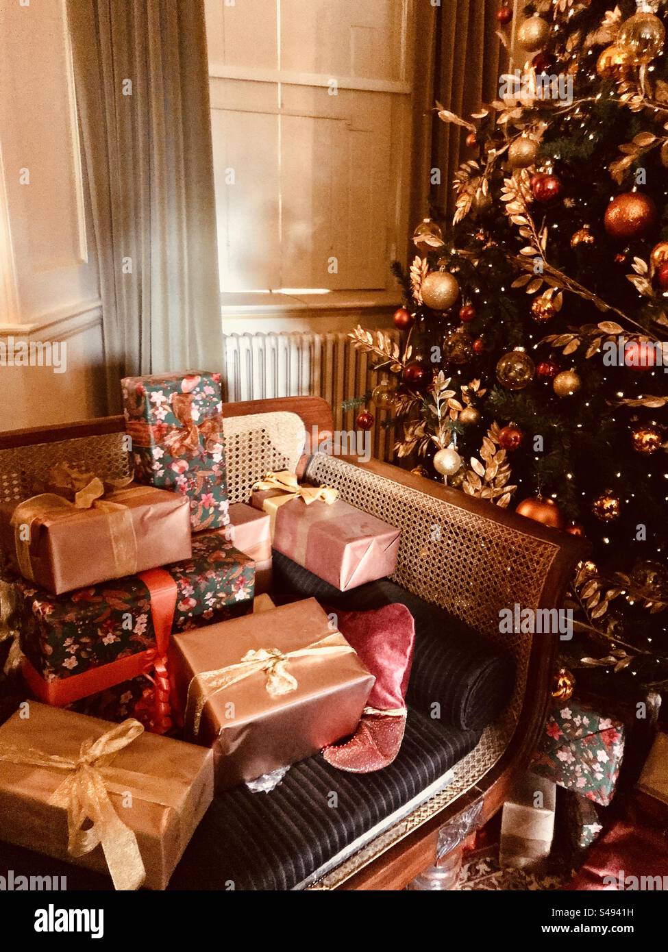 Presents, gifts, under the Christmas tree, Mottisfont, Hampshire Stock Photo