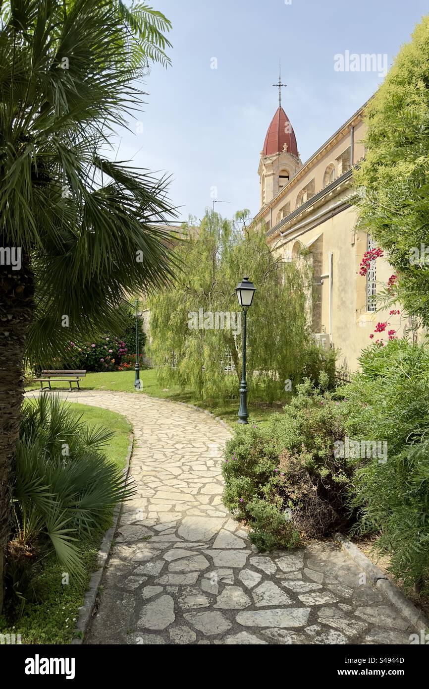 Landscape photo of the beautiful park near the church in Palavas, Occitanie, France. - Smartphone Captured Stock Image