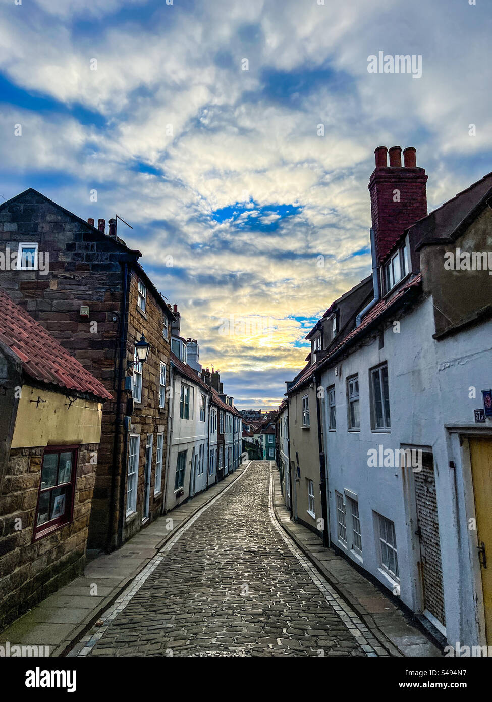Cobblestone street and quaint houses and cottages on Henrietta Street