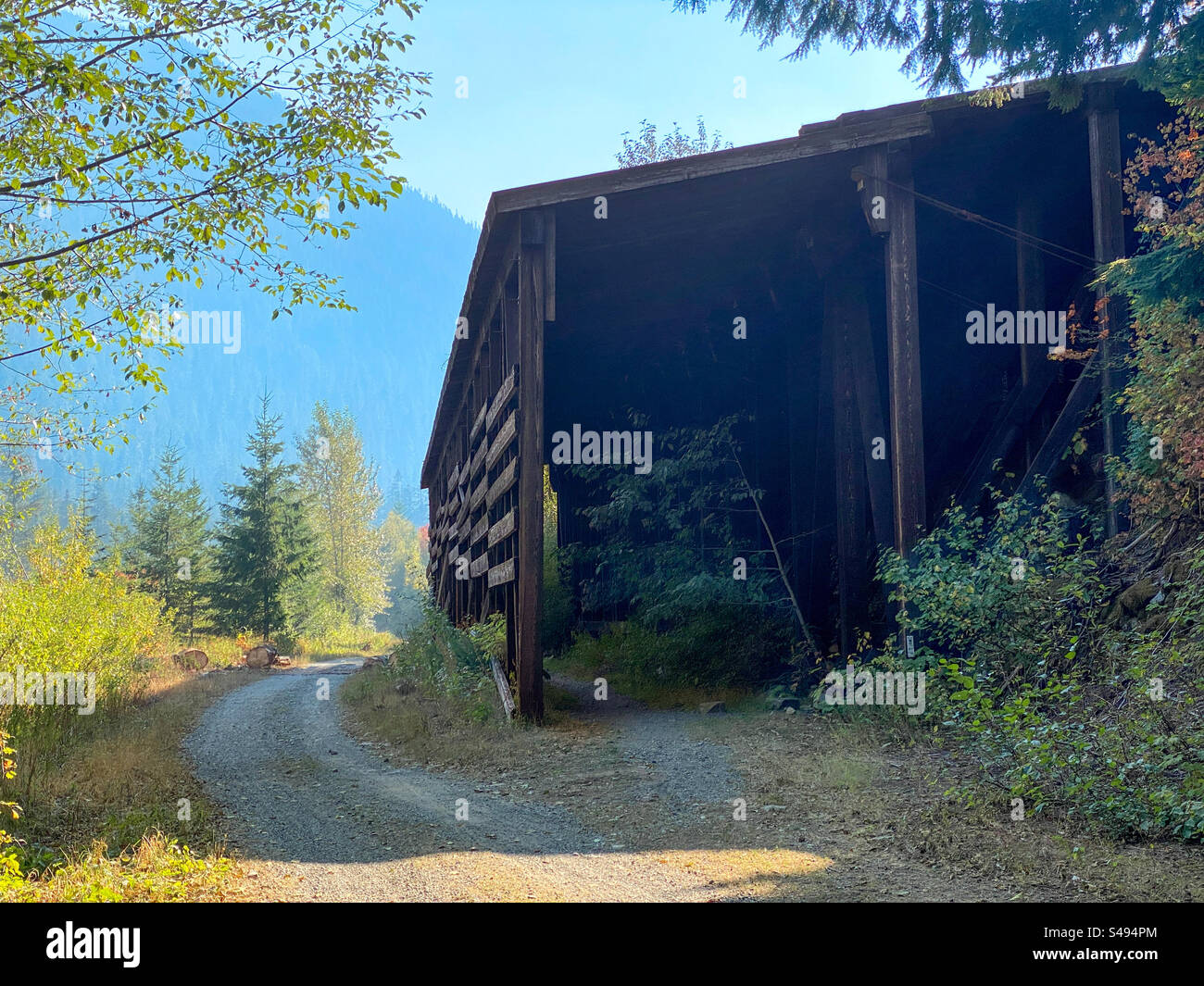 Avalanche shelter along a converted bike trail in the foothills of the Cascade mountains in Washington state Stock Photo