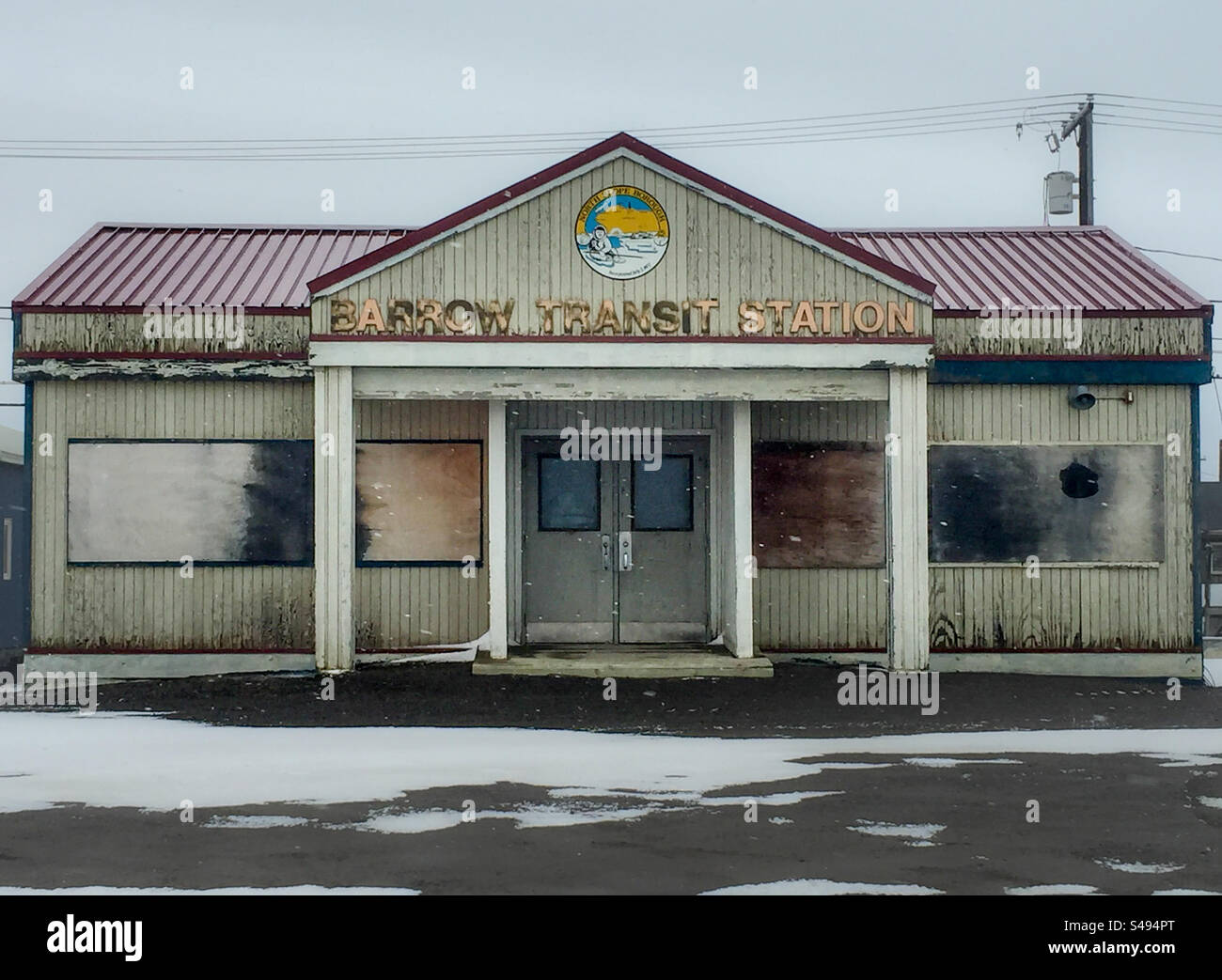 The old boarded up Barrow Transit Station in Barrow, Alaska Stock Photo