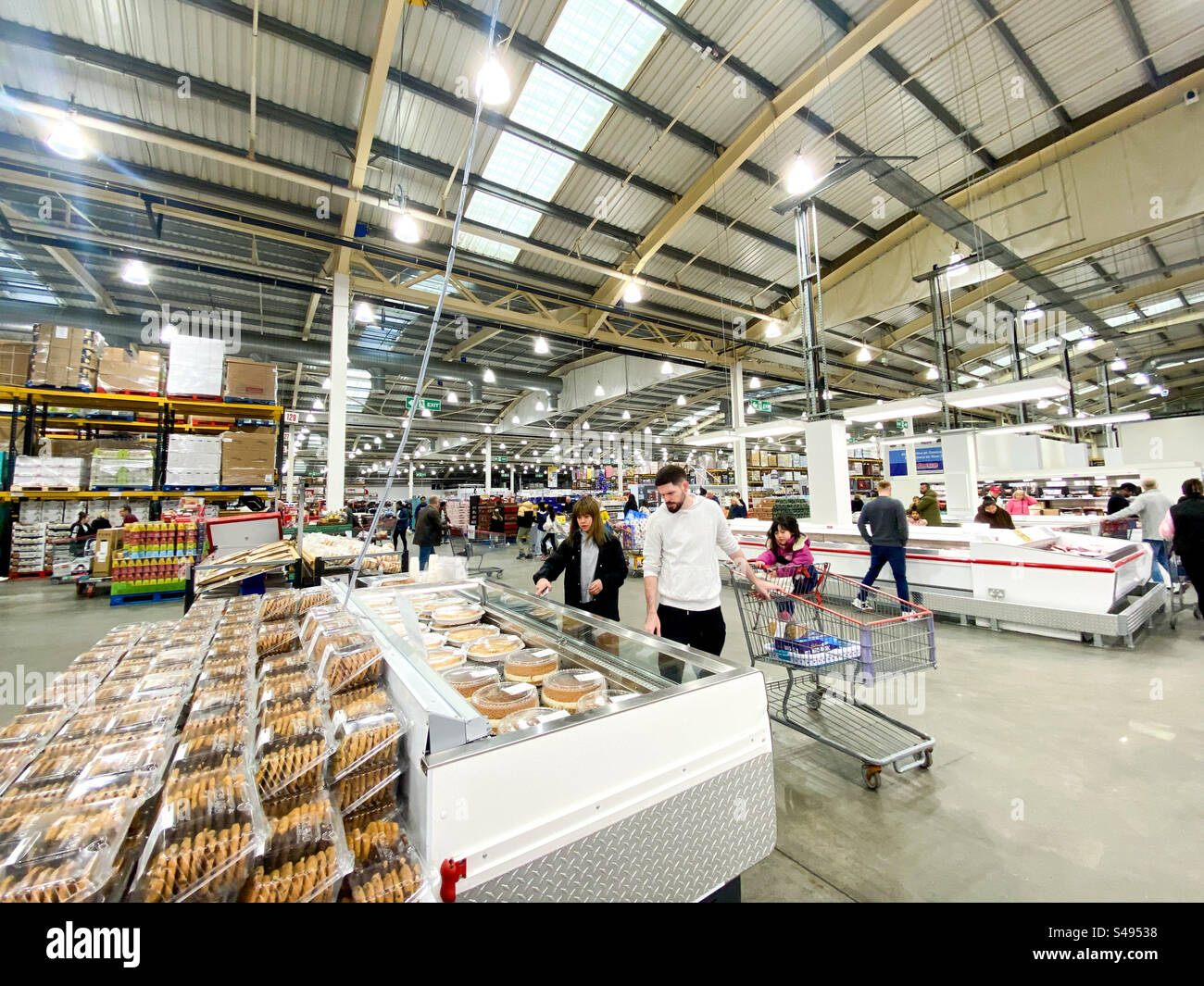 People shopping in a Cosco warehouse superstore in Reading, UK - Smartphone Captured Stock Image
