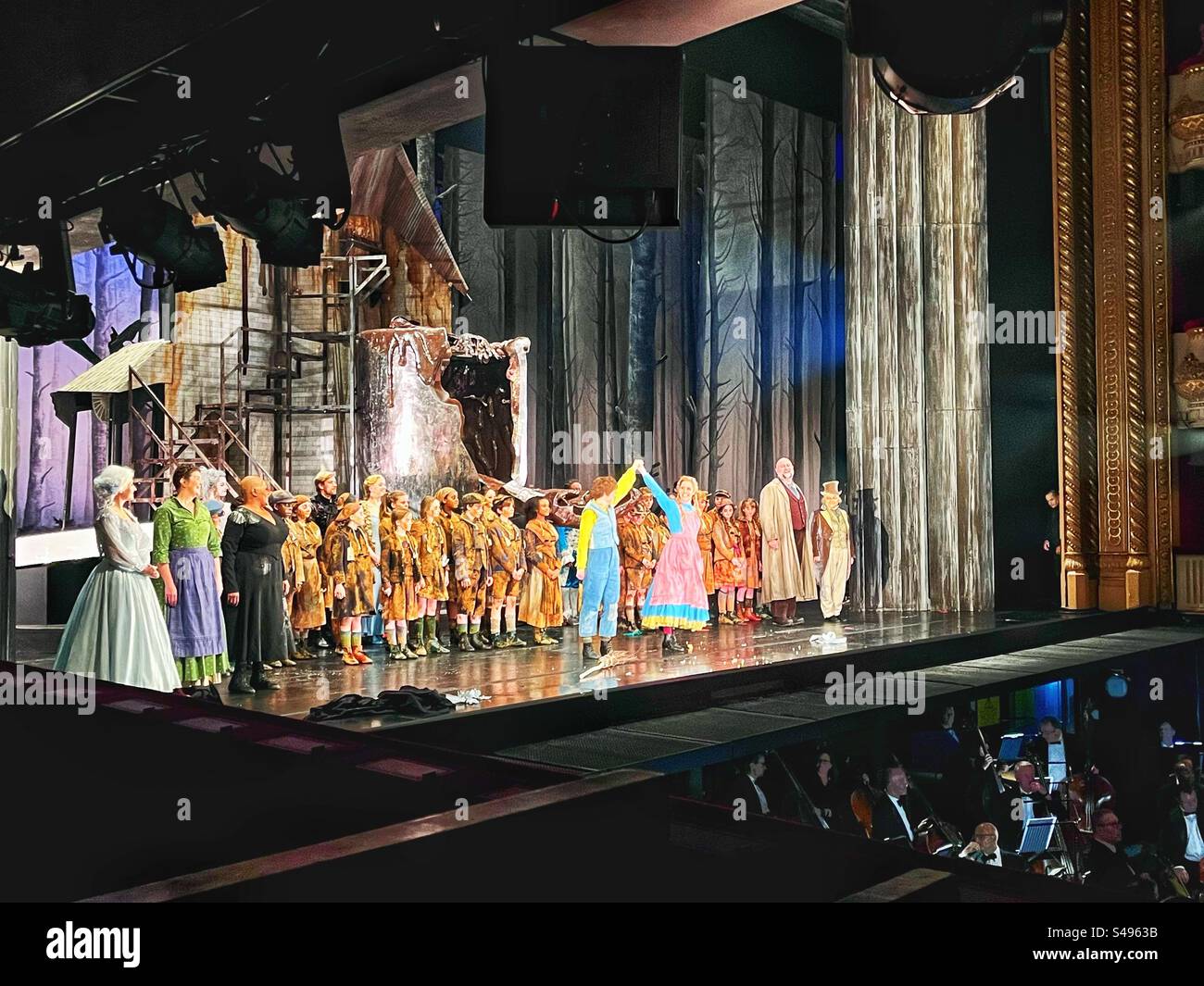 Hansel and Gretal take a curtain call at the Royal Opera House in Covent Garden in London. Opera by Engelbert Humperdinck - Smartphone Captured Stock Image