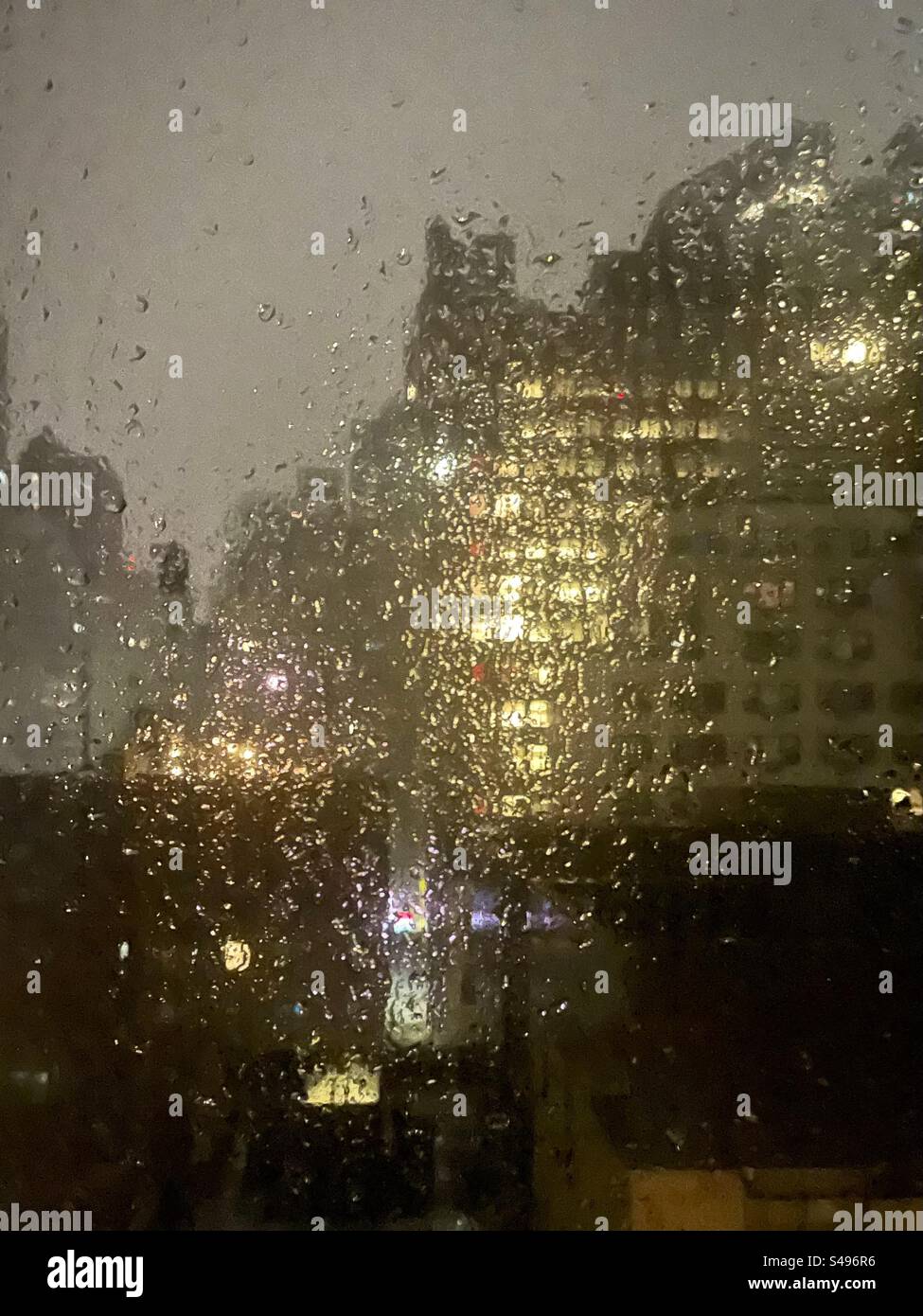 New York City skyline has seen through raindrops - Smartphone Captured Stock Image