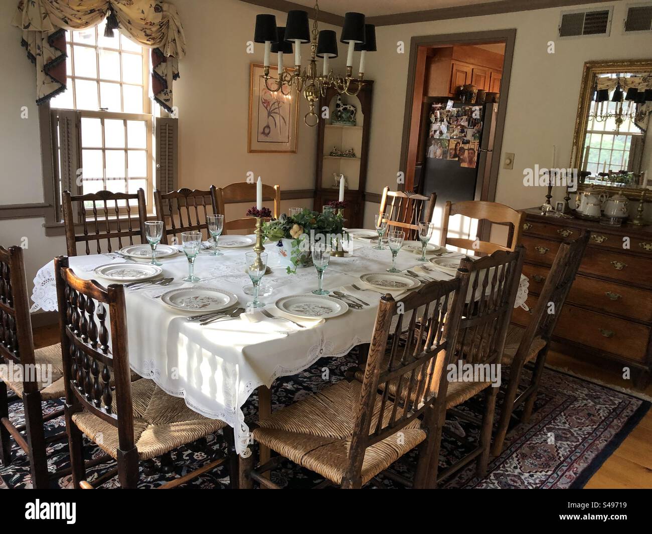 Dining room table set for company. - Smartphone Captured Stock Image