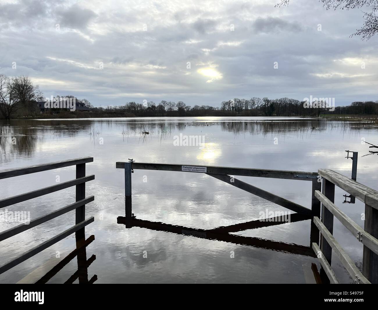 Losser, Netherlands. The river 'Dinkel' has overflowed its banks near Losser. That creates a beautiful spectacle. Stock Photo