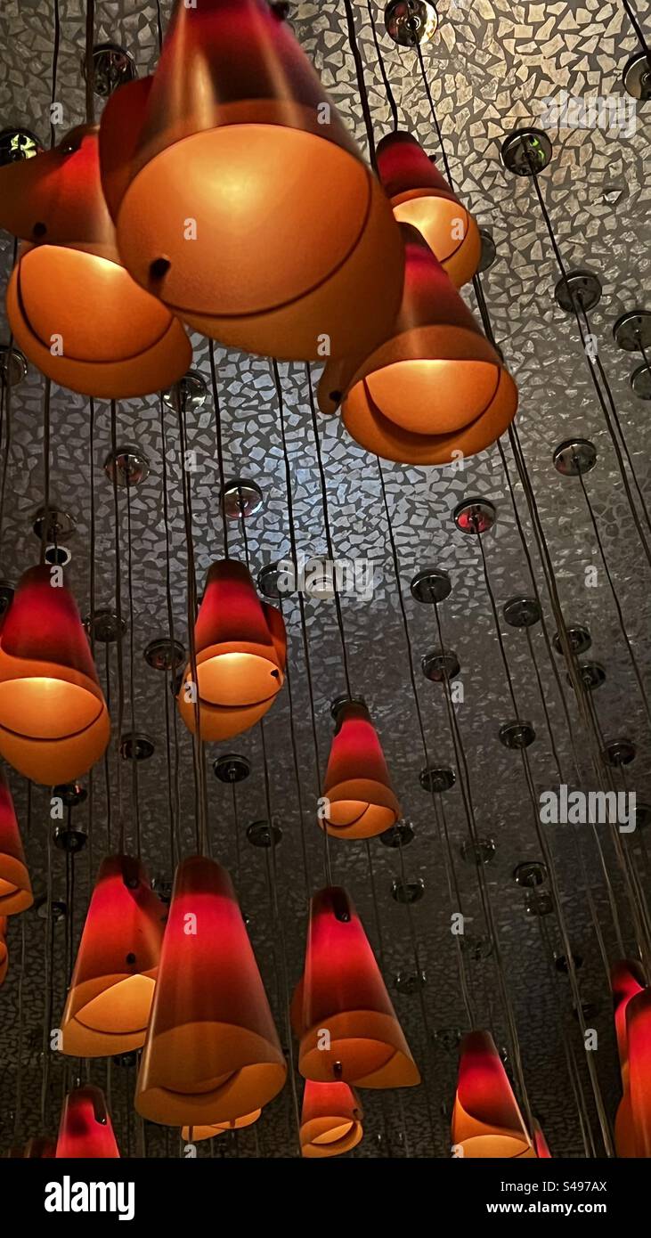 Fancy light fixtures hanging from the ceiling Stock Photo