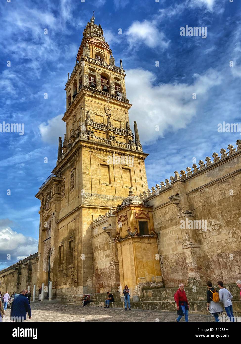 Ancient bell tower of the Mosque-Cathedral forming part of the external walls in Córdoba, Spain. - Smartphone Captured Stock Image