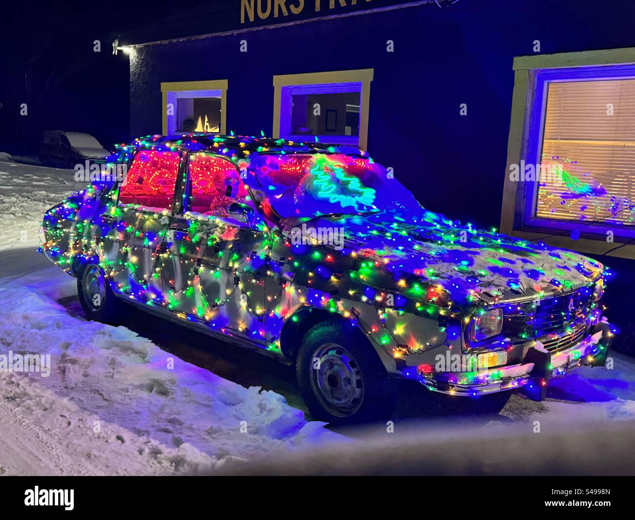 Christmas Car Illuminated in Tromsø, Norway. Many lights. Stock Photo