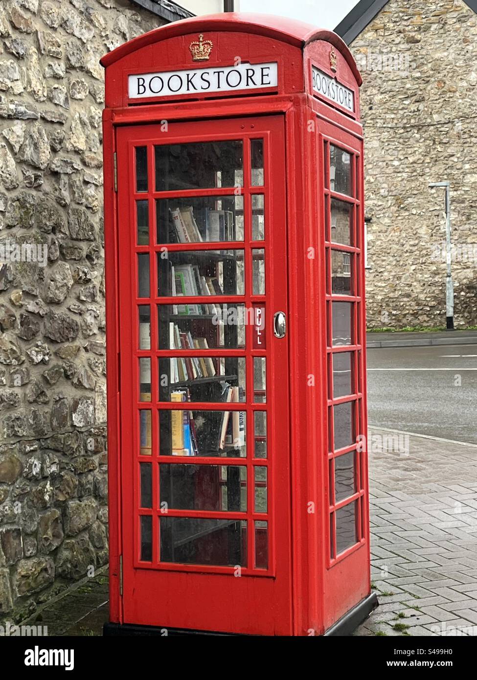 Bookstore Old Red Telephone Box - Smartphone Captured Stock Image