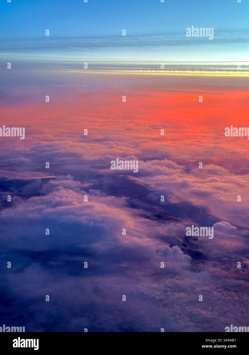 Above the clouds at sunrise - Smartphone Captured Stock Image