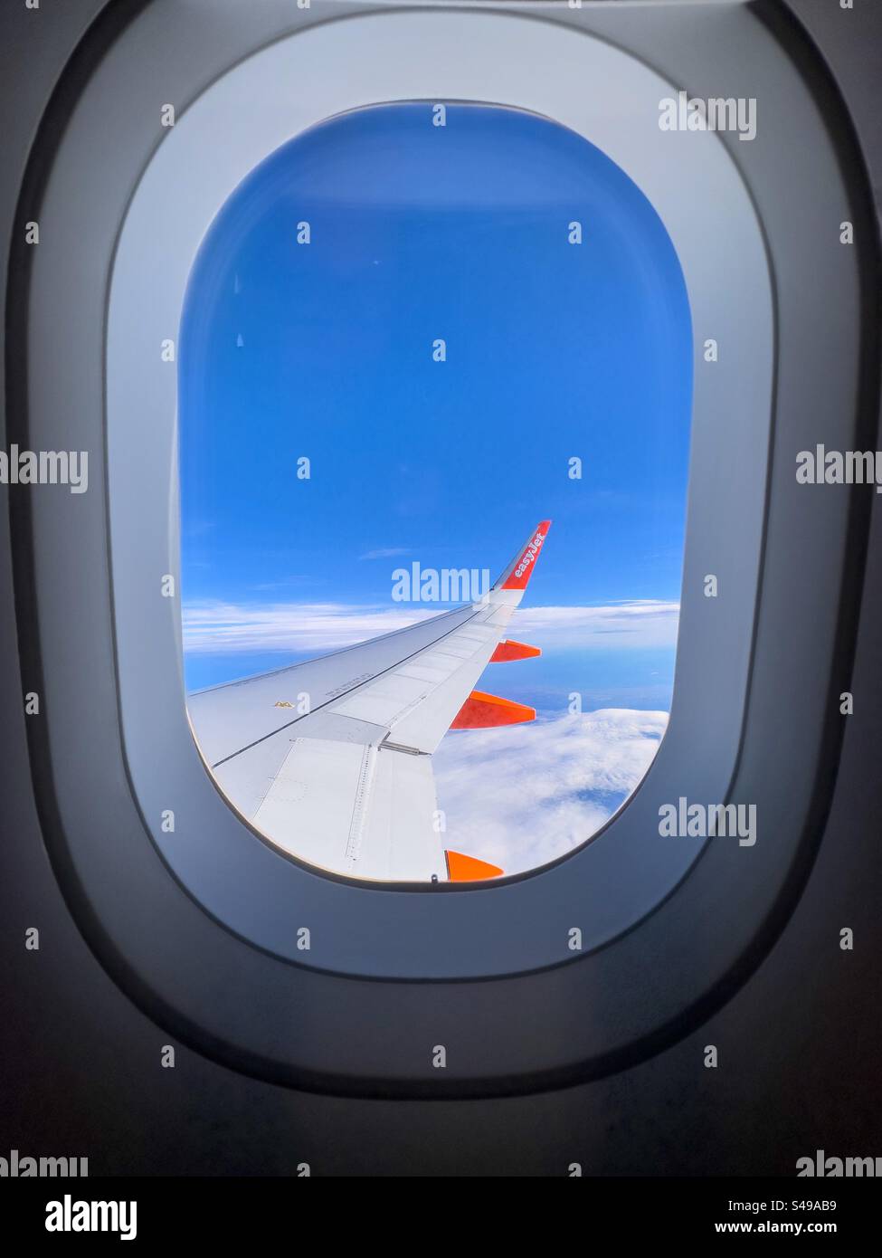 View from the plane. Window. - Smartphone Captured Stock Image