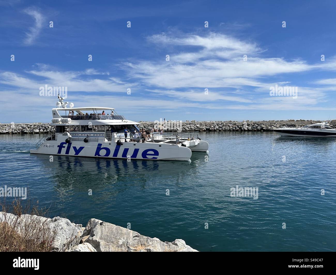 Fly Blue operated ferry service between Puerto Banus and Marbella - Smartphone Captured Stock Image