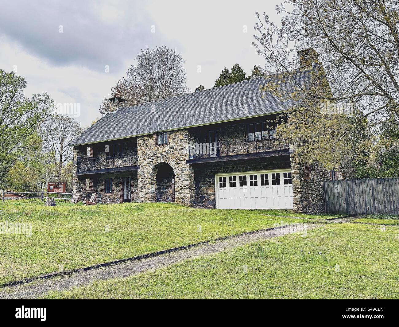 Westbrook, Connecticut, USA: Two-story stone building at U.S. Fish and Wildlife Service Salt Meadow site. Stewart B. McKinney National Wildlife Refuge. Lape-Read house. - Smartphone Captured Stock Image