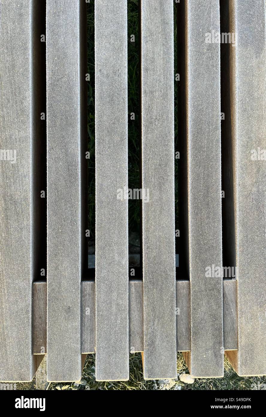 An abstract view of a frozen, frosty park bench on a winter morning - Smartphone Captured Stock Image