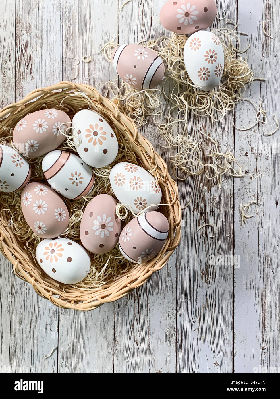 Painted eggs in a basket Stock Photo
