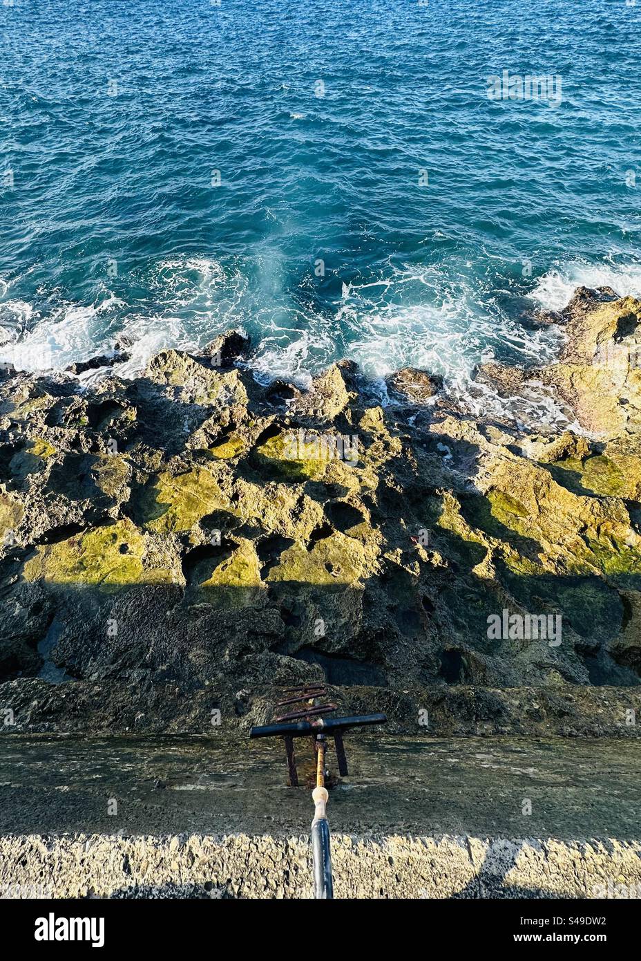 Stair to go down in Malecón, Havana, Cuba - Smartphone Captured Stock Image