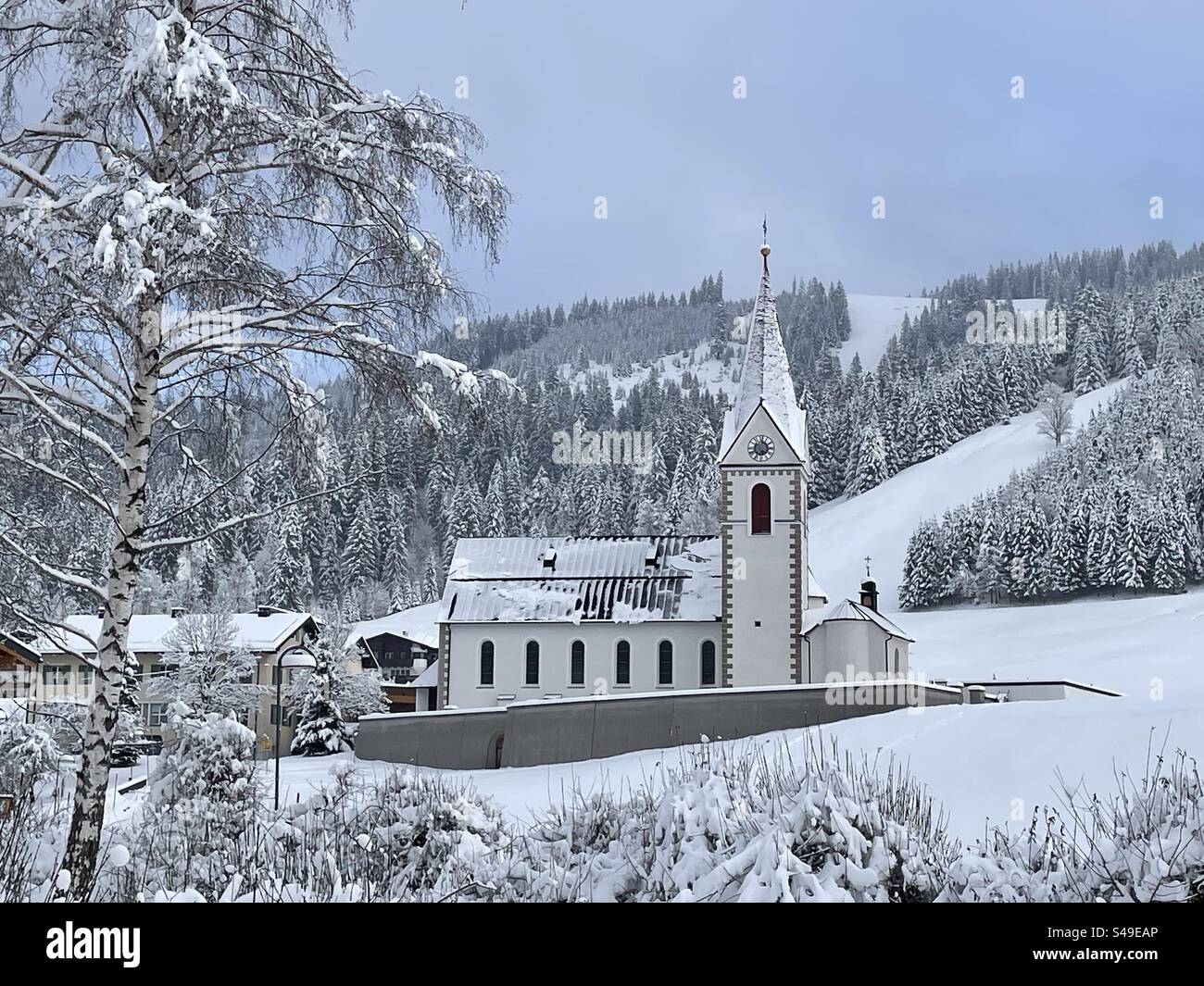 Church and town Schattwald in Tannheimertal, Winter, Tyrol, Austria Stock Photo