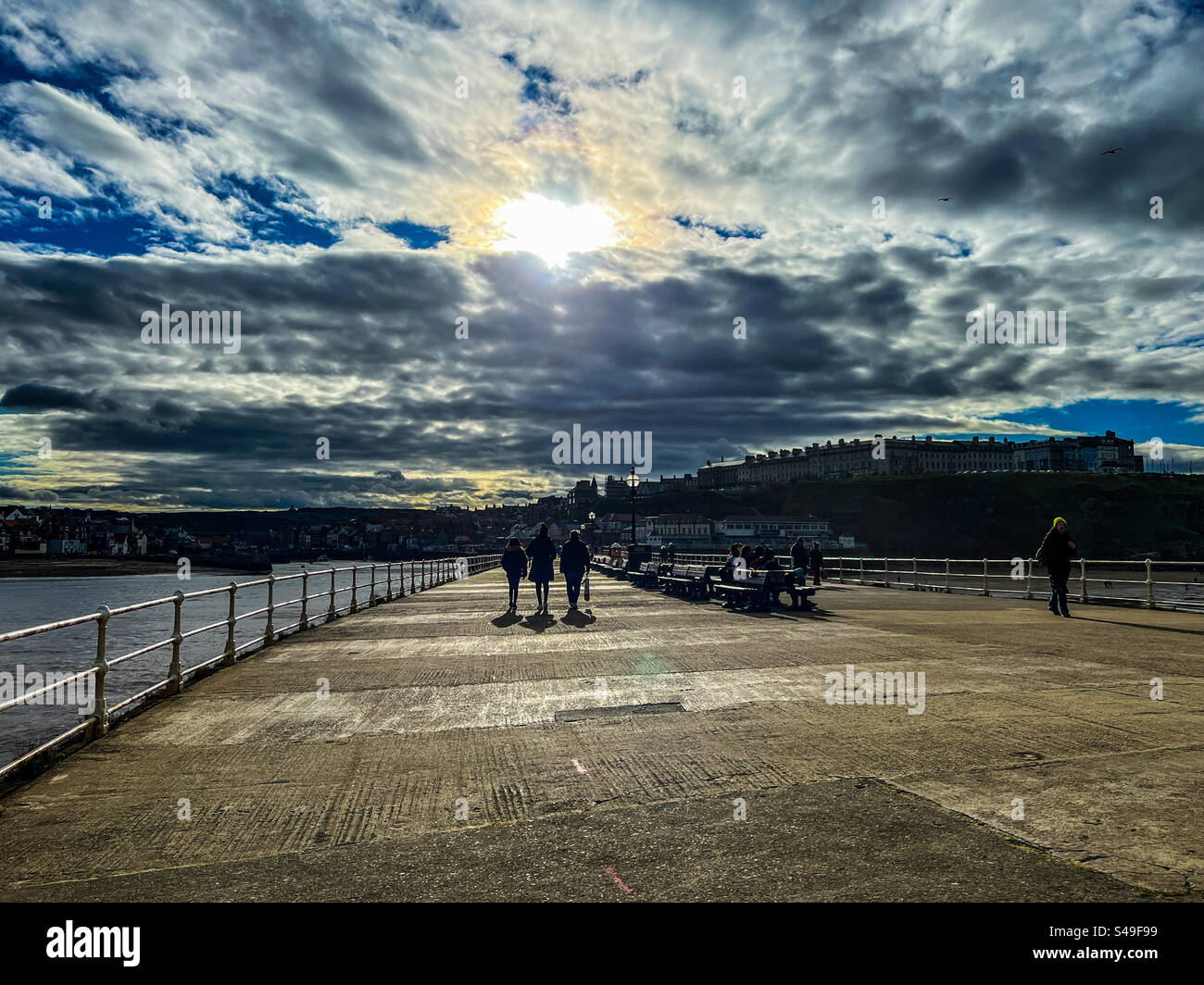 View down Whitby pier at sunset - Smartphone Captured Stock Image