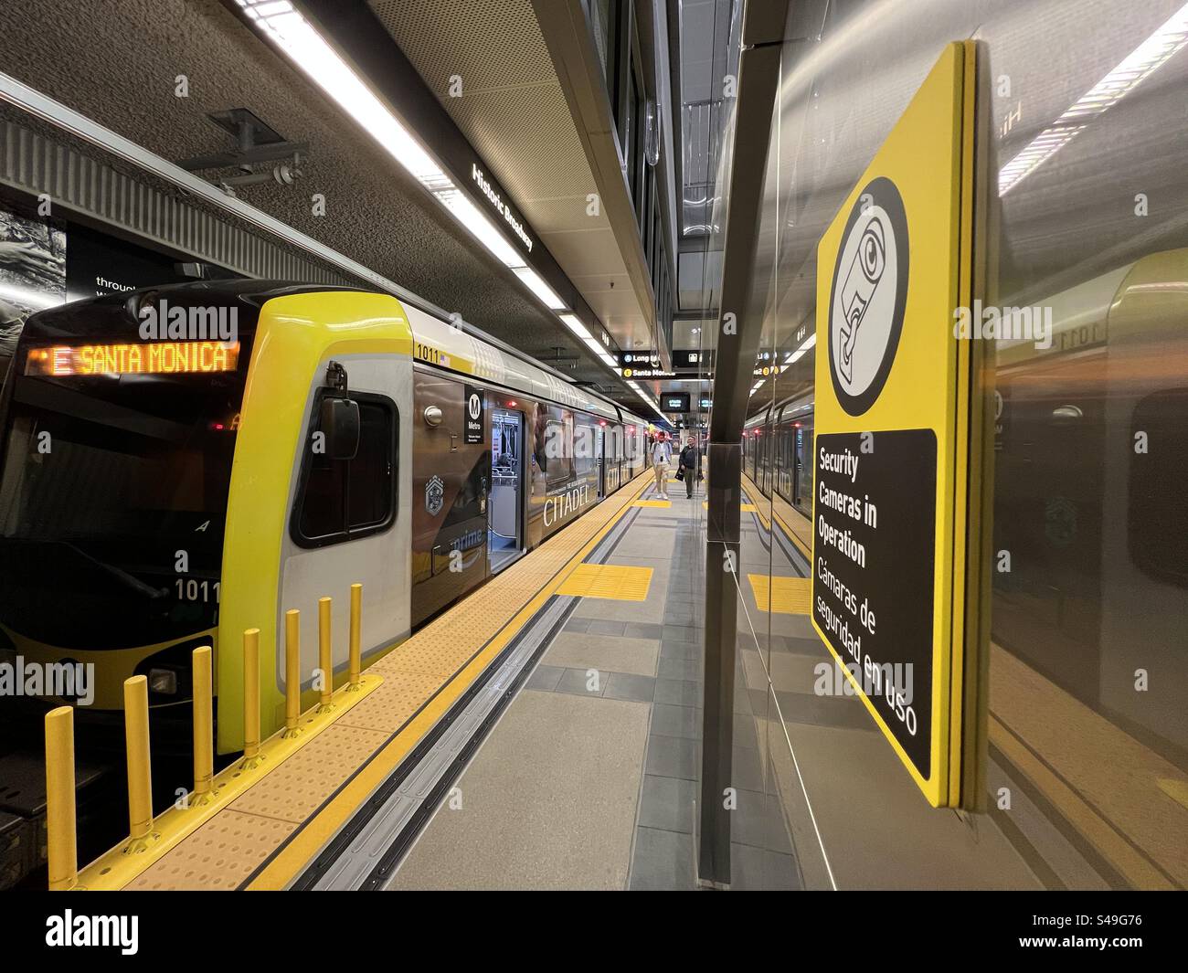 LOS ANGELES, CA, JUN 16, 2023: LA Metro E Line train heading to Santa Monica, arrives at new Historic Broadway station, opening day of new rail connector with three new stations in Downtown - Smartphone Captured Stock Image