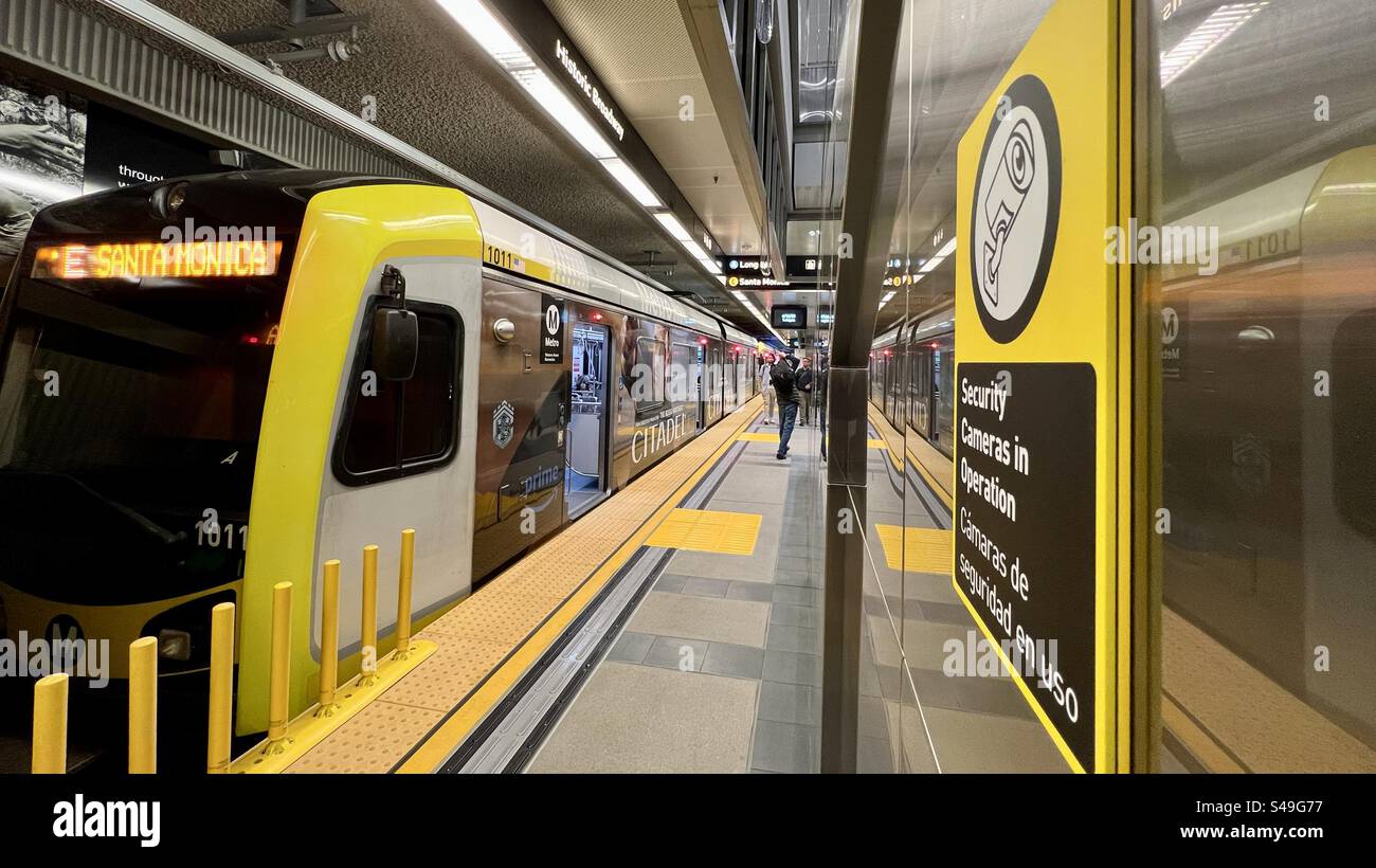 LOS ANGELES, CA, JUN 16, 2023: LA Metro E Line train heading to Santa Monica, pulling into new Historic Broadway station, opening day of new rail connector with three new stations in Downtown - Smartphone Captured Stock Image