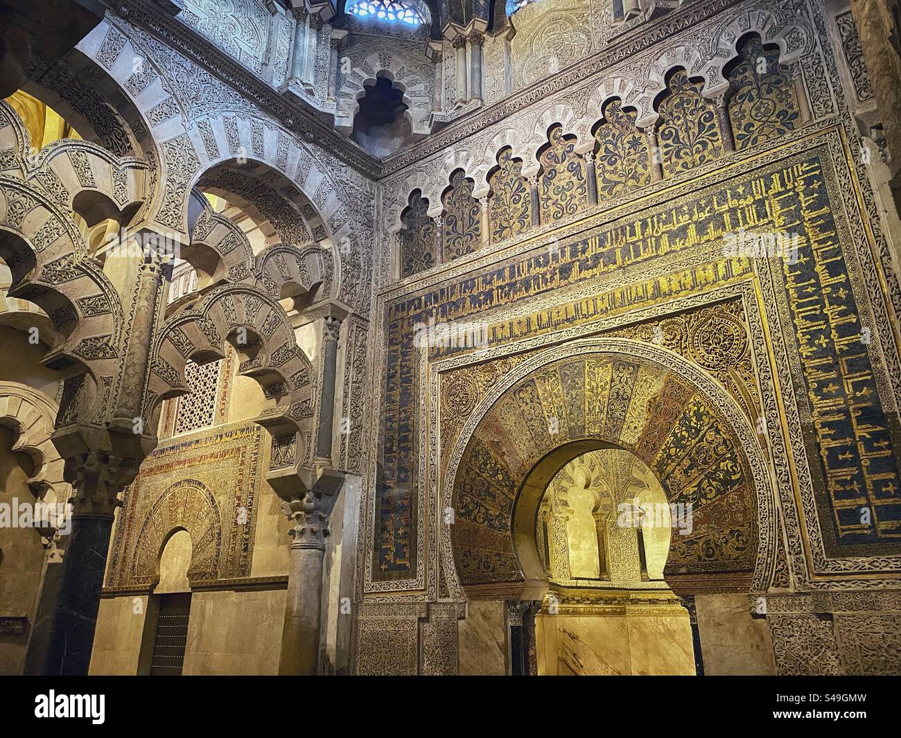 Ornate interior highly decorated with islamic ornaments inside the Mosque-Cathedral in Córdoba, Spain. - Smartphone Captured Stock Image