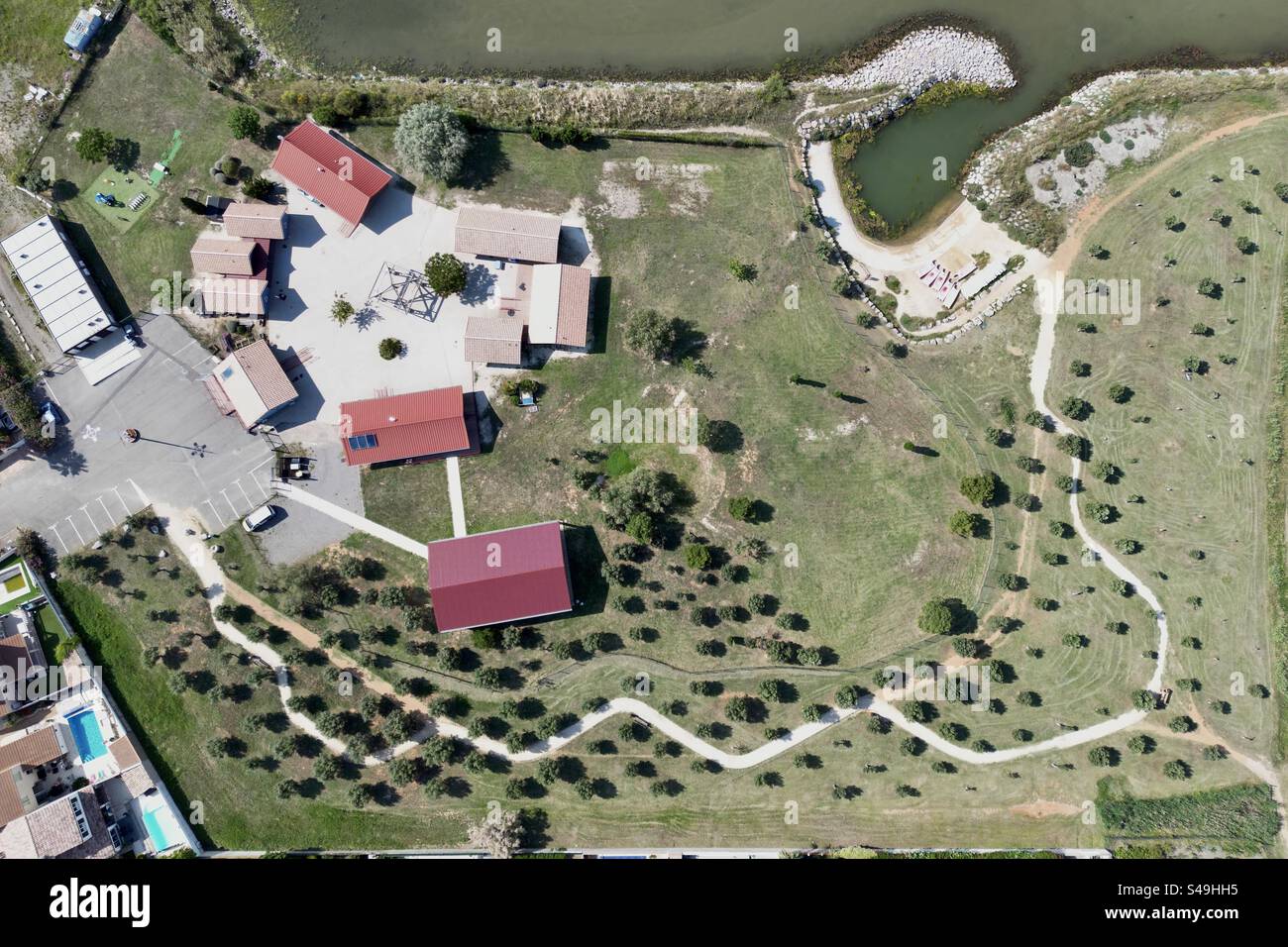 Aerial drone top-down view of Parc du Levant park in Palavas, Occitanie, France. - Smartphone Captured Stock Image