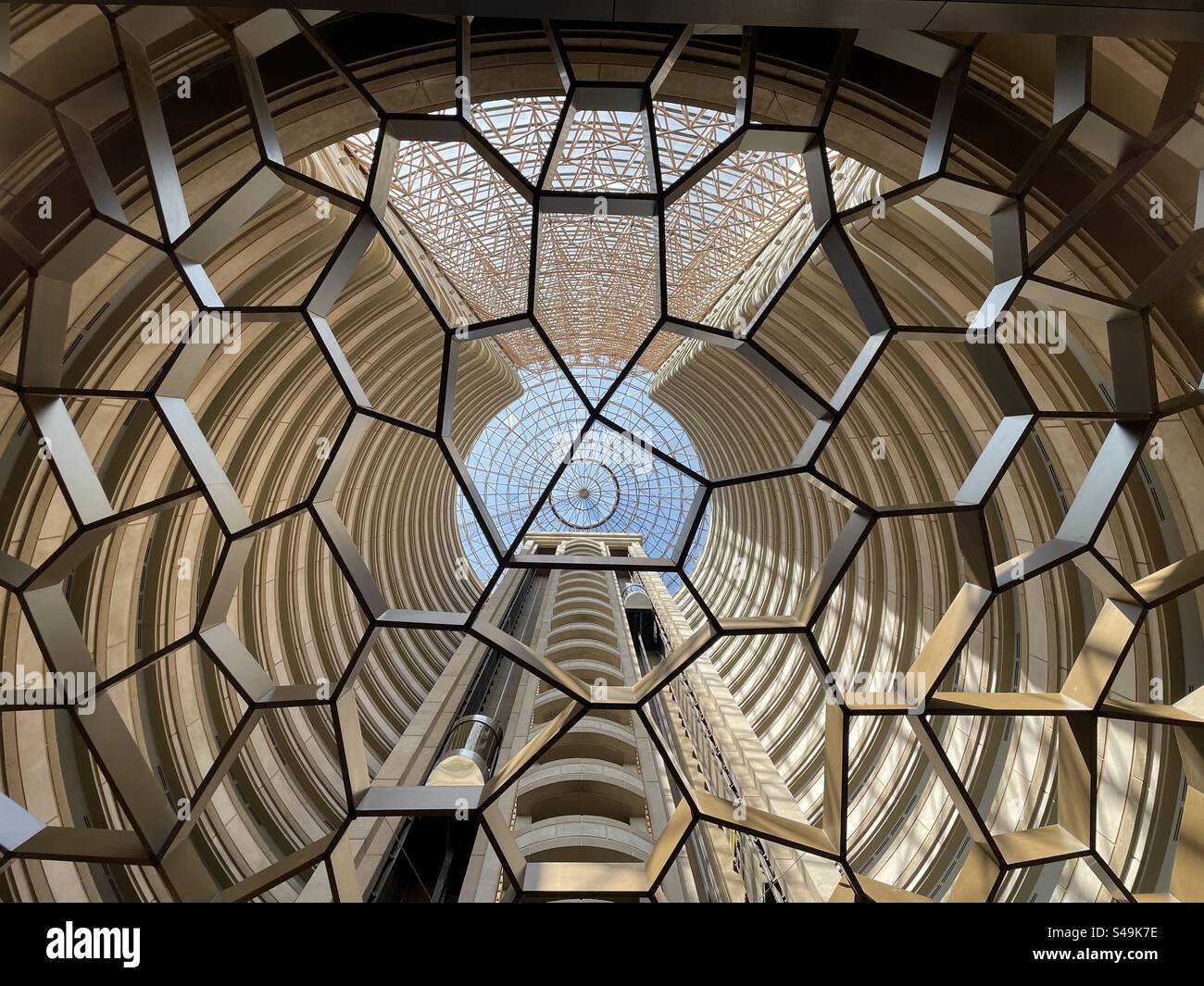The foyer at the Mandarin Oriental hotel in Santiago Chile looking up at the ceiling with the lift shaft - Smartphone Captured Stock Image