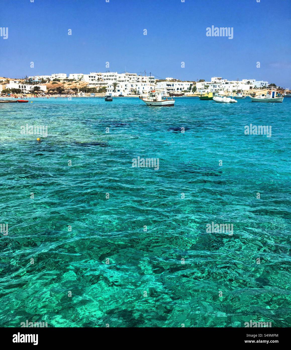Crystal clear water in Koufonisia islands, Cyclades, Greece - Smartphone Captured Stock Image