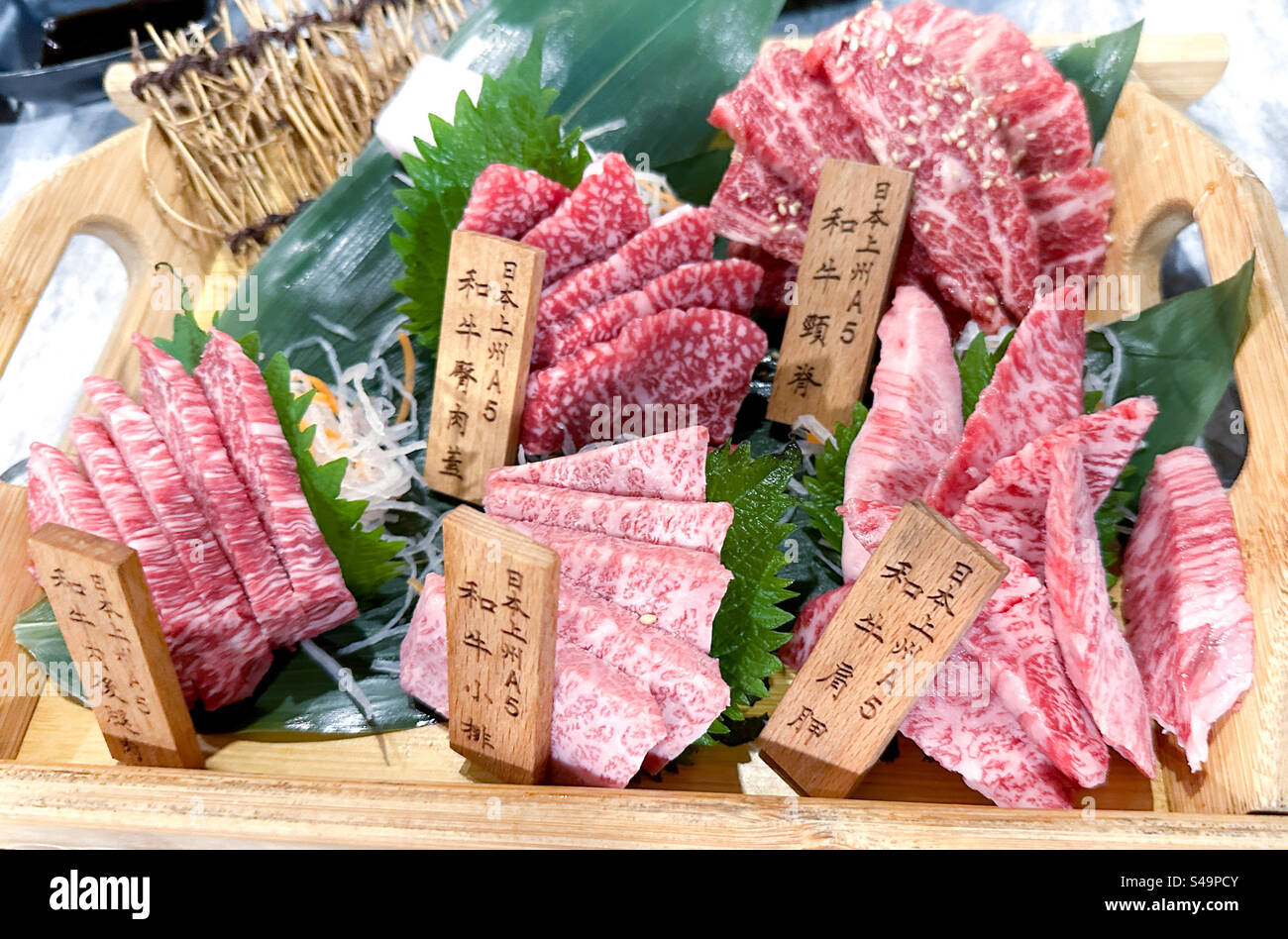 Assortment of fresh prime o’toro tuna sashimi at fancy Japanese restaurant - Smartphone Captured Stock Image