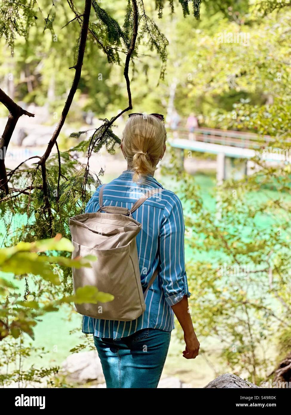 Traveling by forest and finding a beautiful blue lake - Smartphone Captured Stock Image