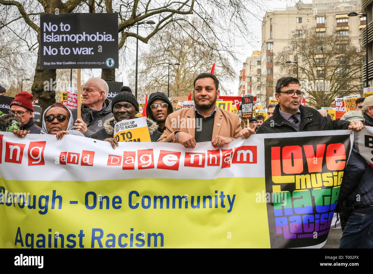 London, UK, 16th Mar 2019.  Protesters in central London.  A march, organised by activist groups 'Stand Up to Racism' and 'Love Music Hate Racism', and supported by unions TUC and UNISON, proceeds from Hyde Park Corner via Piccadilly and Trafalgar Square to Whitehall and Downing Street in Westminster. Similar events are held in other locations on UN Anti Racism Day. Credit: Imageplotter/Alamy Live News Stock Photo