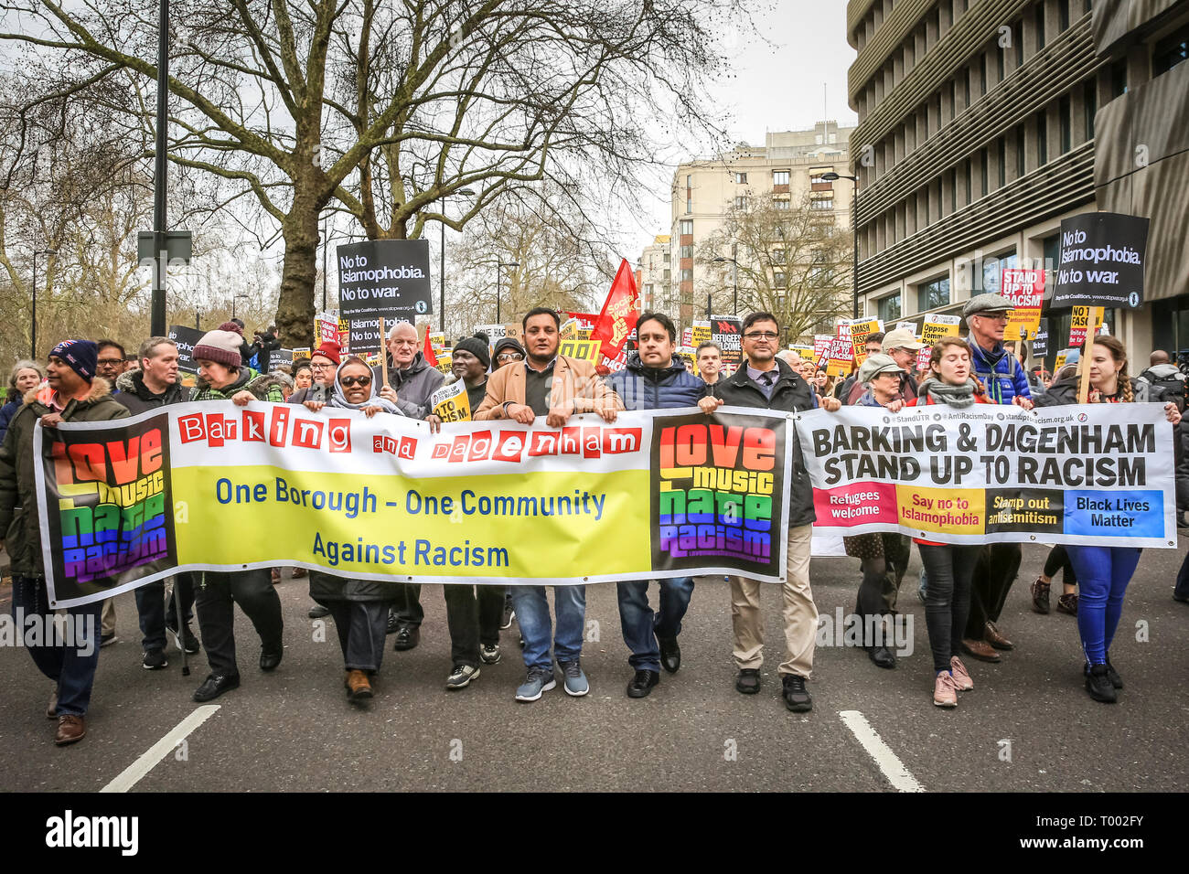 London, UK, 16th Mar 2019.  Protesters in central London.  A march, organised by activist groups 'Stand Up to Racism' and 'Love Music Hate Racism', and supported by unions TUC and UNISON, proceeds from Hyde Park Corner via Piccadilly and Trafalgar Square to Whitehall and Downing Street in Westminster. Similar events are held in other locations on UN Anti Racism Day. Credit: Imageplotter/Alamy Live News Stock Photo