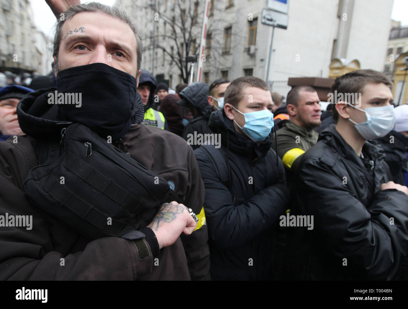 Kiev, Kiev, Ukraine. 16th Mar, 2019. Activists are seen gathering outside the Presidential office during the protest.Protest against corruption in the country's defence industry in Kiev, Ukraine. Activists and supporters of ''National Corps'' Ukrainian nationalist party demand for arrests of the top figures in an alleged military corruption scandal, which they were accused of profiting from the sale to state defence companies at inflated prices of smuggled Russian military parts. Credit: Pavlo Gonchar/SOPA Images/ZUMA Wire/Alamy Live News Stock Photo