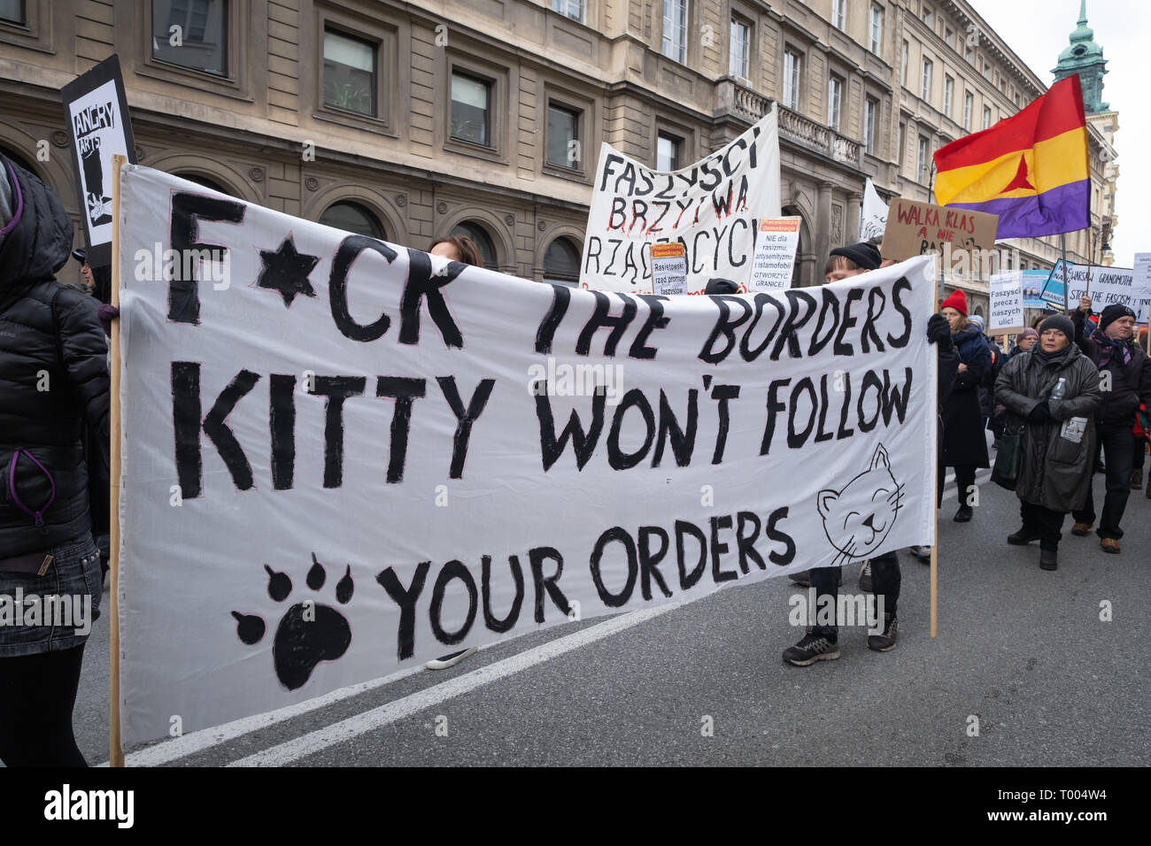 Warsaw, Poland. 16th March, 2019. Anti racist demonstration announced few weeks ago, due to tragic coincidence is also becoming a tribute to victims of terror attack in New Zealand. Antifascist and anti Warsaw, Poland. 16th March, 2019. Anti racist demonstration announced few weeks ago, due to tragic coincidence is also becoming a tribute to victims of terror attack in New Zealand. Antifascist and anti