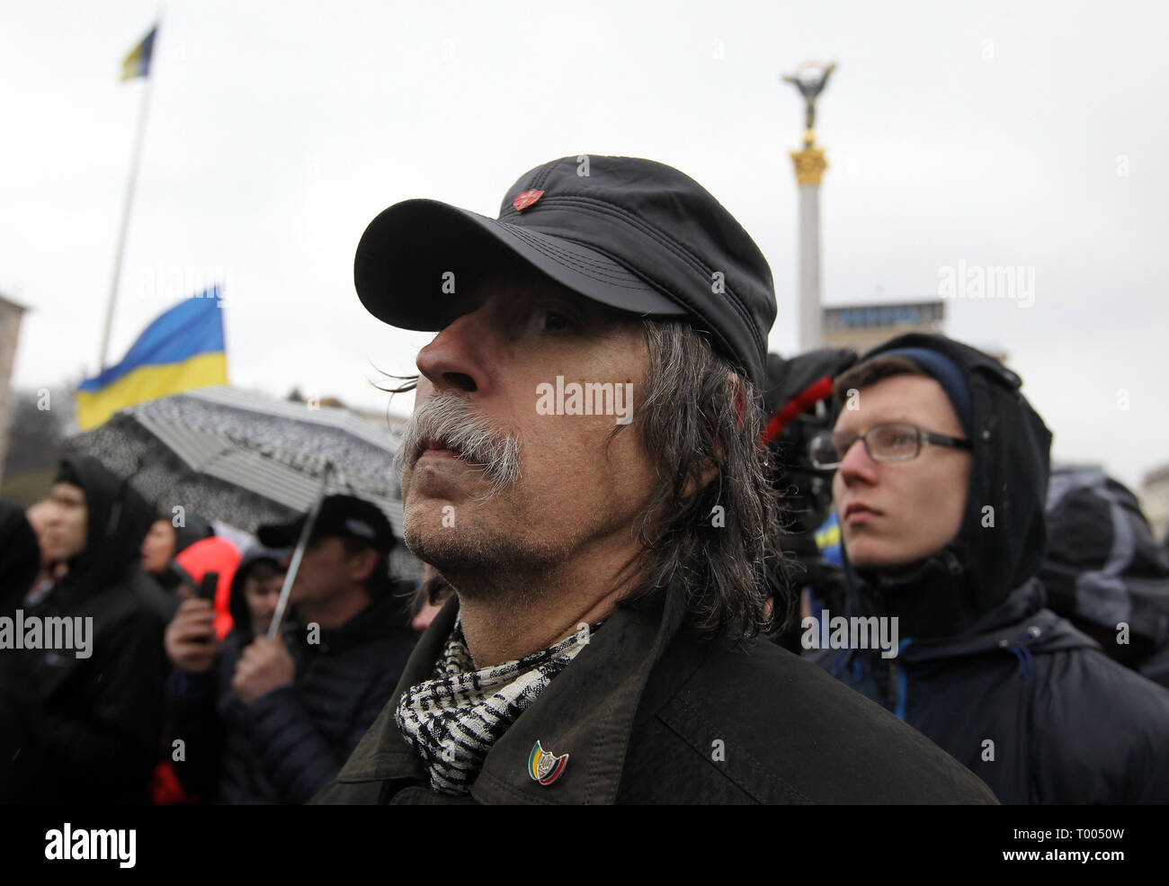 Kiev, Kiev, Ukraine. 16th Mar, 2019. Ukrainians are seen gathering outside the Presidential office during the protest.Protest against corruption in the country's defence industry in Kiev, Ukraine. Activists and supporters of ''National Corps'' Ukrainian nationalist party demand for arrests of the top figures in an alleged military corruption scandal, which they were accused of profiting from the sale to state defence companies at inflated prices of smuggled Russian military parts. Credit: Pavlo Gonchar/SOPA Images/ZUMA Wire/Alamy Live News Stock Photo