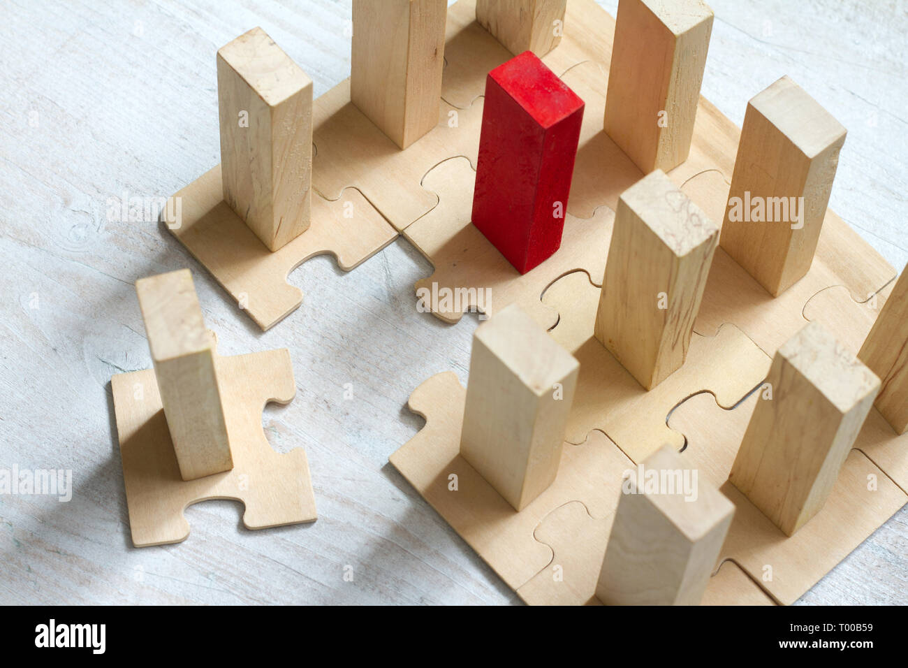 Leadership team and new employee abstract business concept with puzzle and block Stock Photo