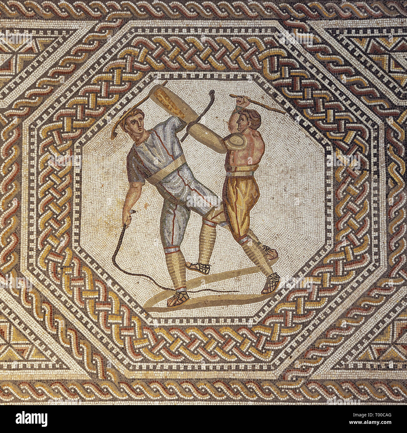 Editorial: NENNIG, SAARLAND, GERMANY, September 2, 2018 - Two gladiators fighting with a whip and a club depicted in the Roman villa in Nennig Stock Photo