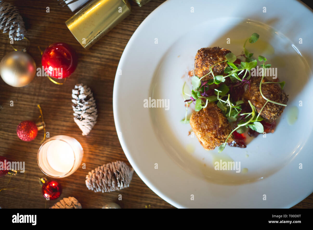 festive breaded cheese balls with cranberry sauce Stock Photo Alamy