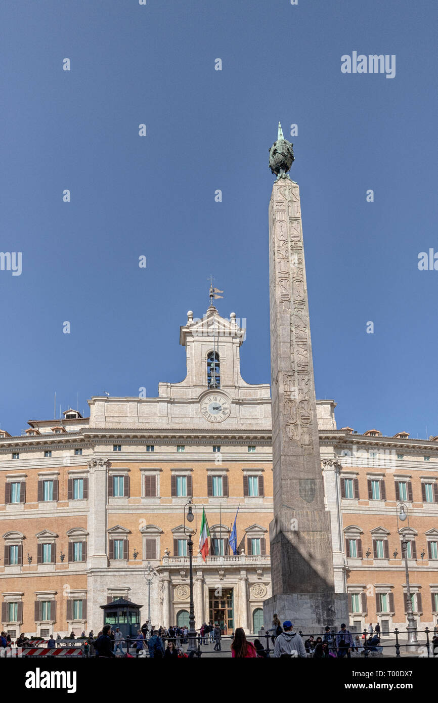 Rome, Italy - March 03, 2019: View of the facade of Palazzo Montecitorio, home of the Chamber of Deputies of the Italian Republic. Stock Photo