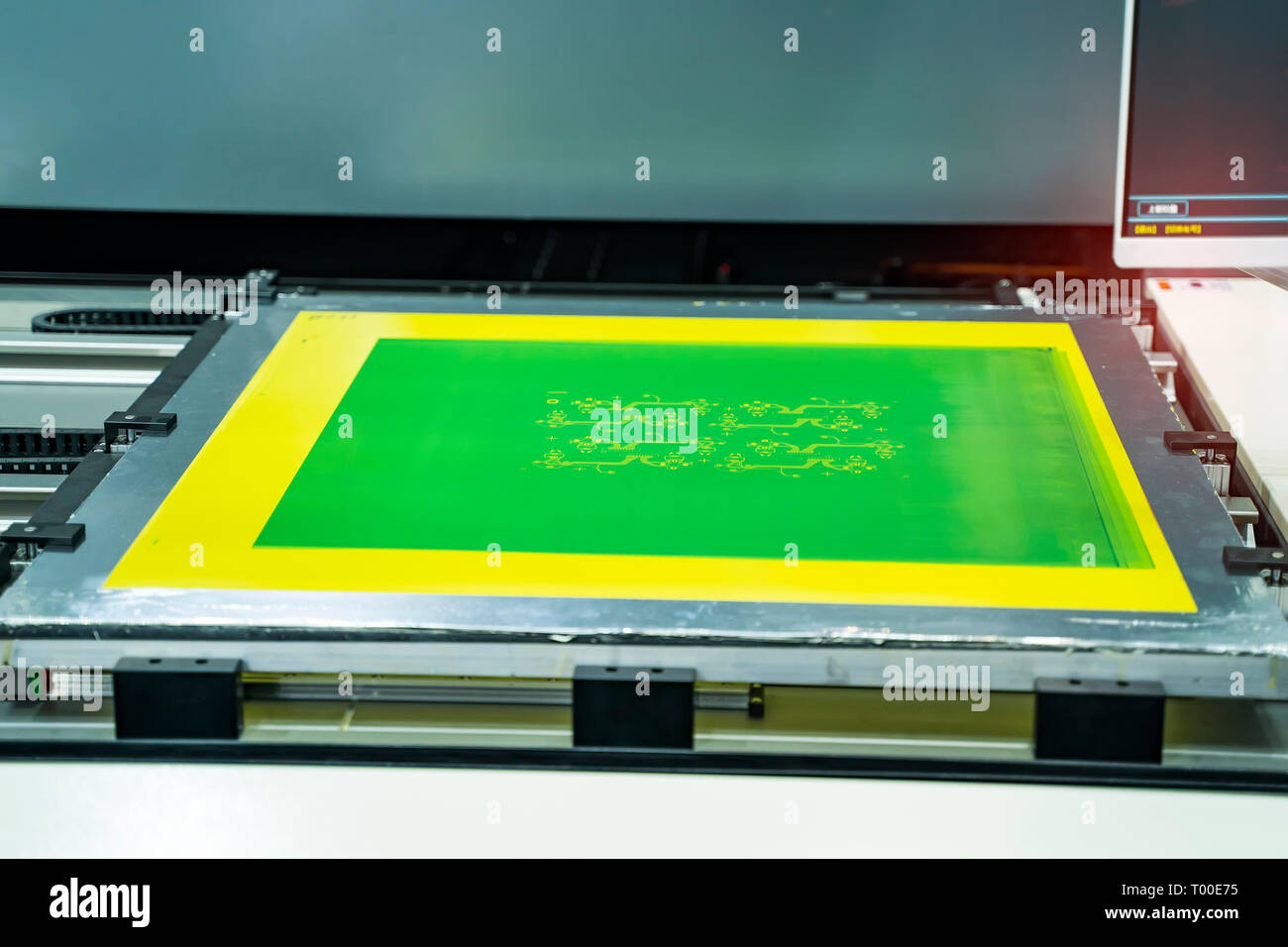 PCB Processing on CNC machine working in factory Stock Photo