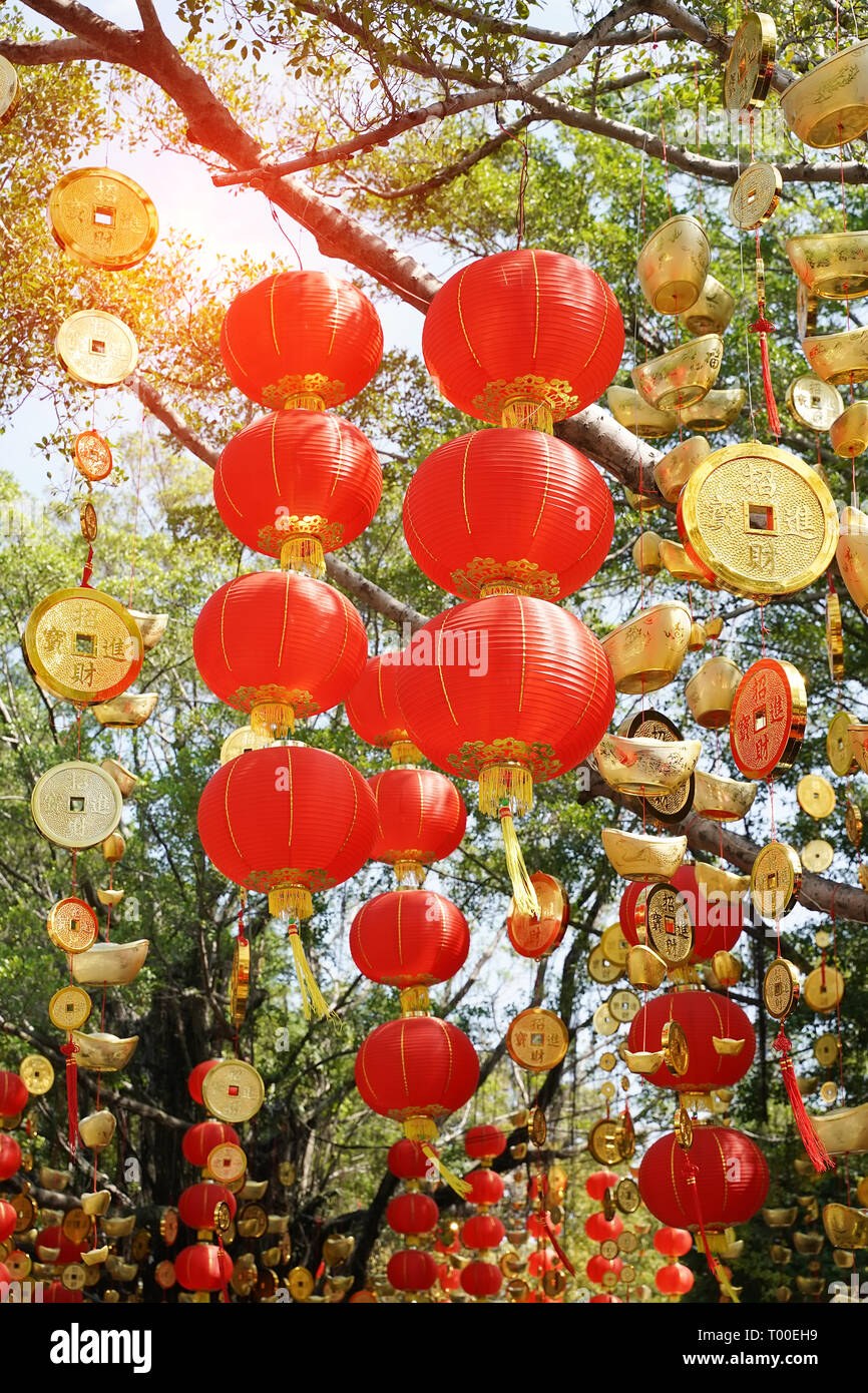Tradition decoration lanterns of Chinese,calligraphy on coin translation:  best wishes and good luck for money Stock Photo - Alamy