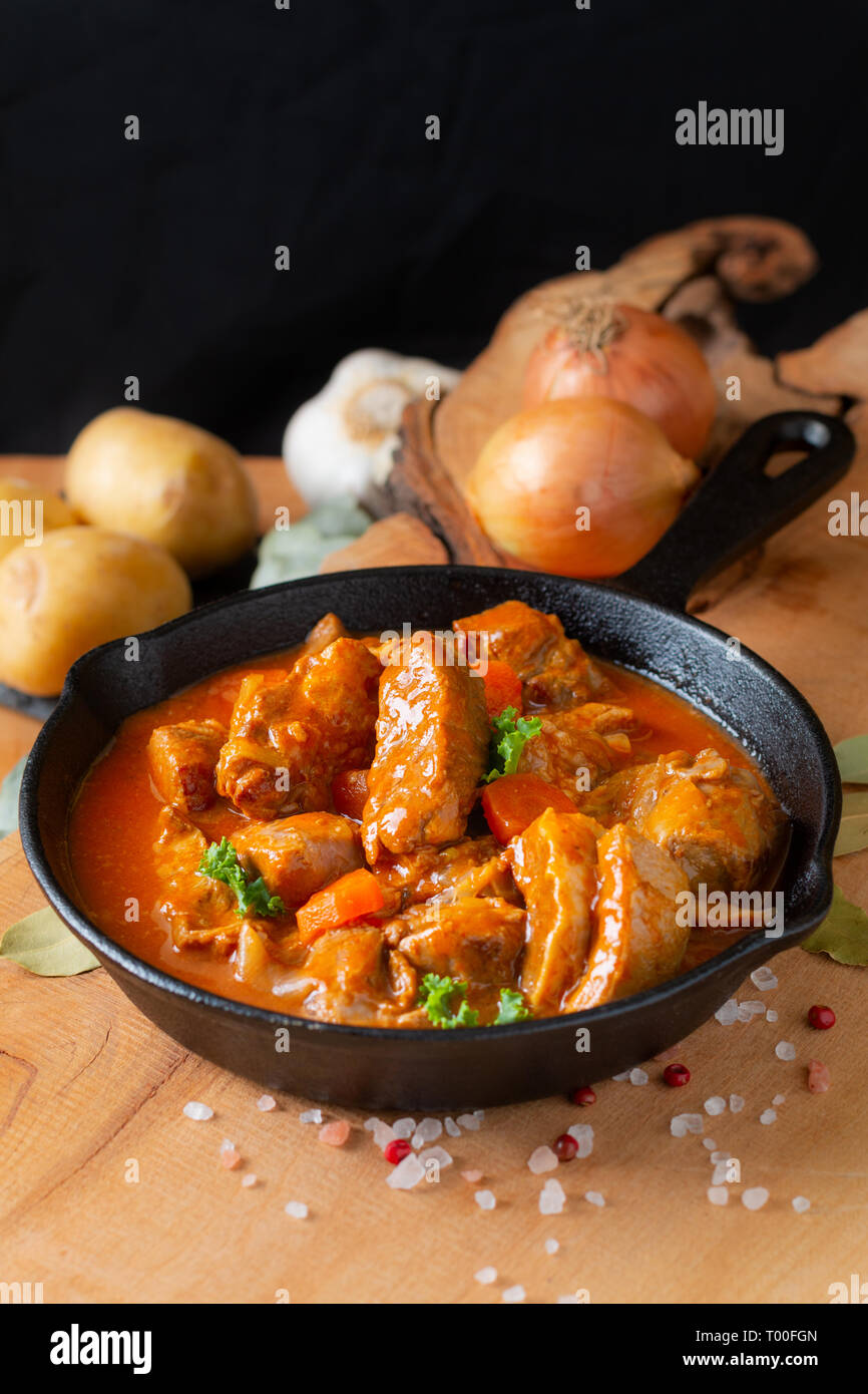 Food concept french classic veal stew marengo de veau in skillet iron